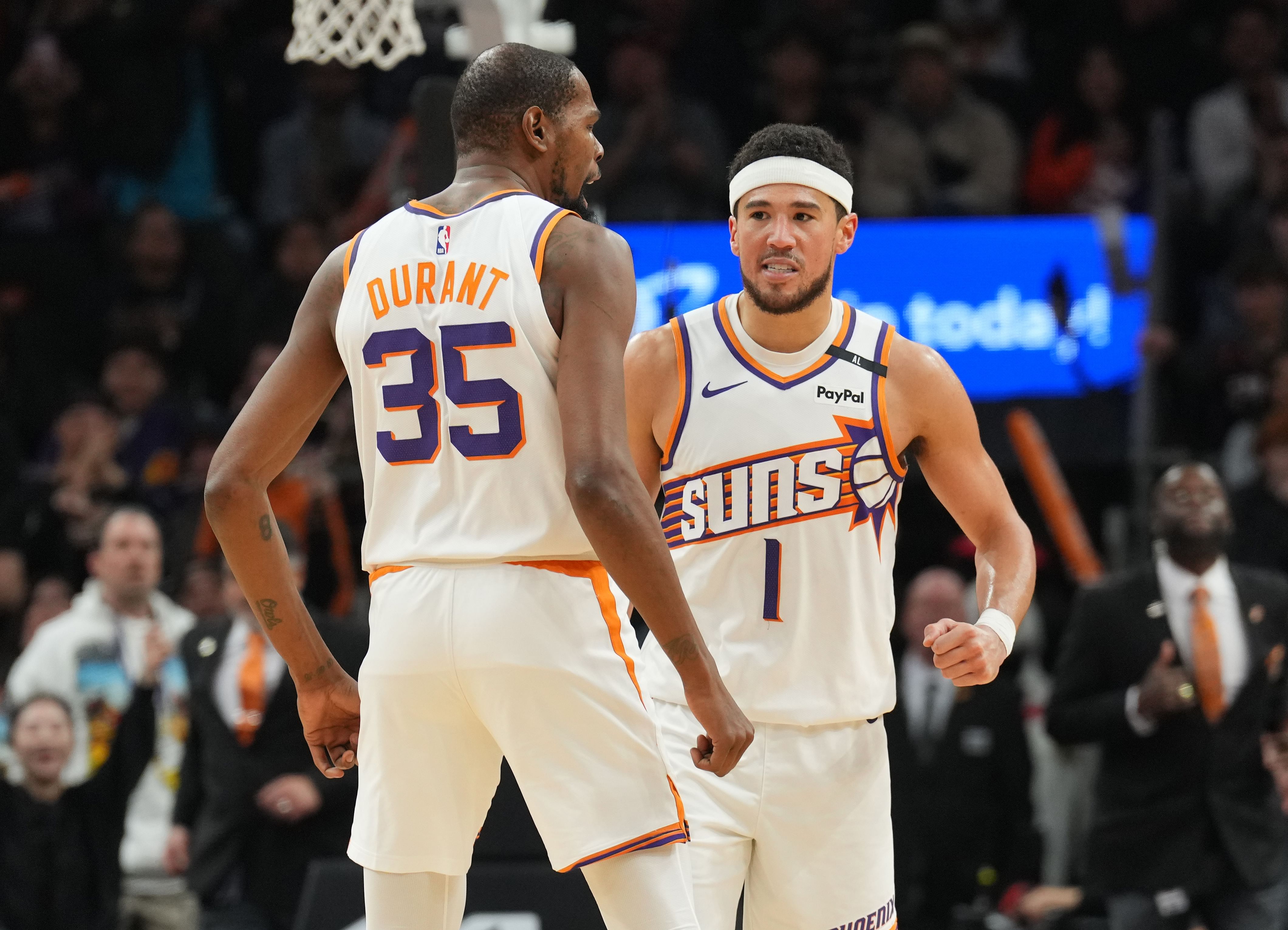 Phoenix Suns forward Kevin Durant (35) and guard Devin Booker (1) - Source: Imagn