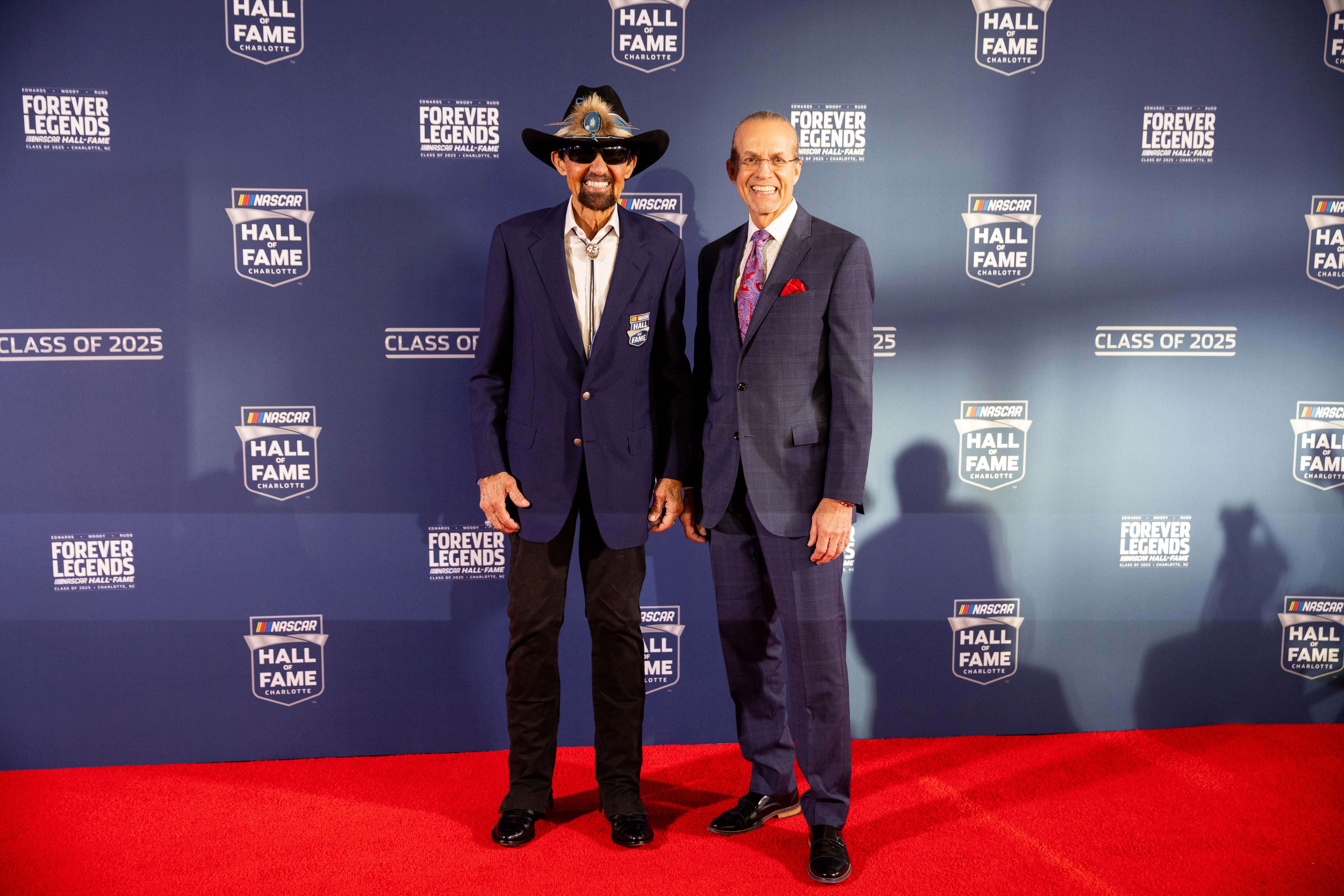 Richard Petty and son Kyle Petty on the red carpet before the 2025 NASCAR Hall of Fame Induction Ceremony at Charlotte Convention Center - Source: Imagn