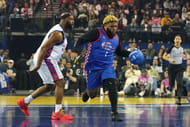 Druski of Team Rice dribbles the ball against Baron Davis of Team Bonds during the celebrity game at Oakland Arena. Photo Credits Imagn