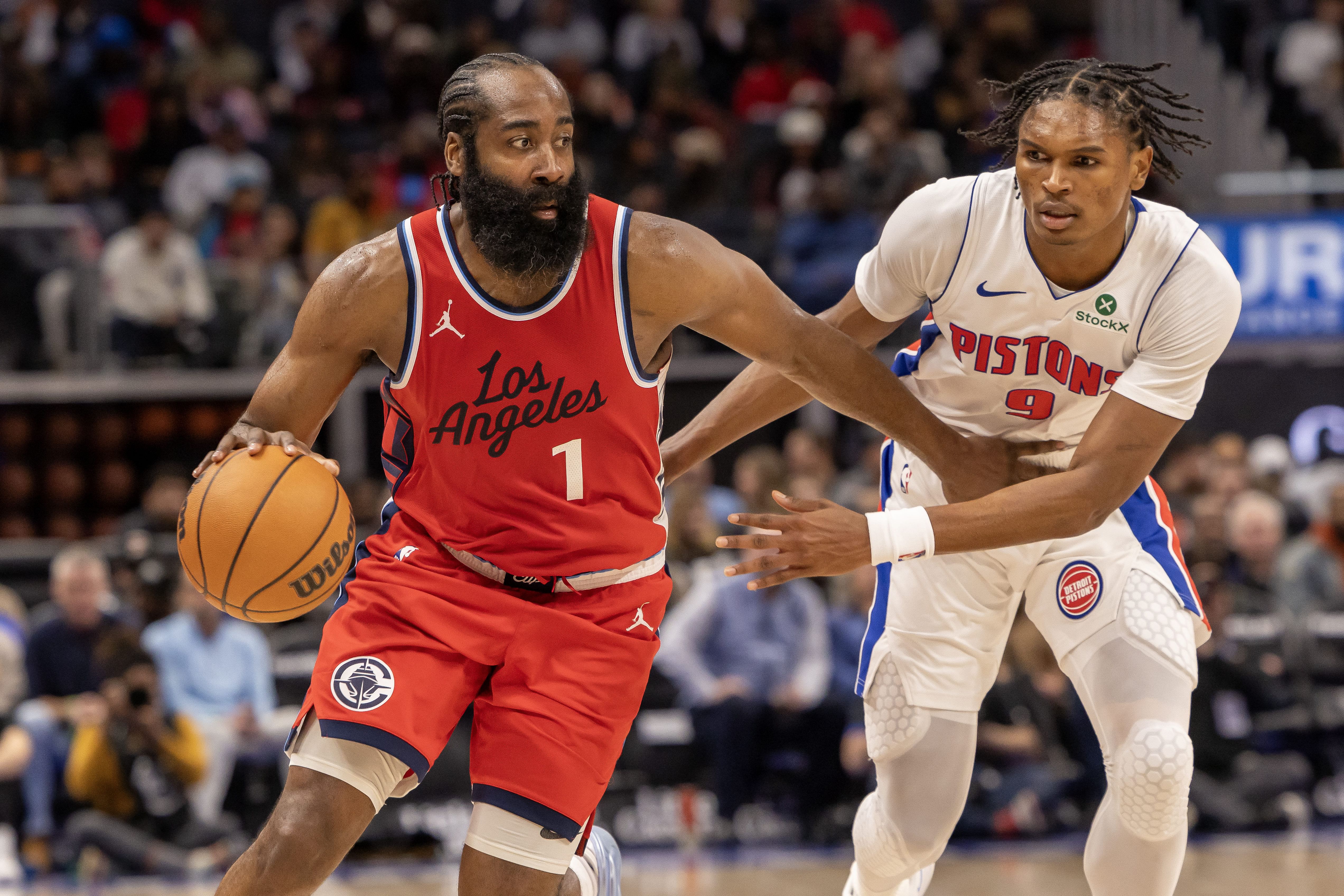 Detroit Pistons forward Ausar Thompson defends against LA Clippers guard James Harden at Little Caesars Arena. Photo Credit: Imagn