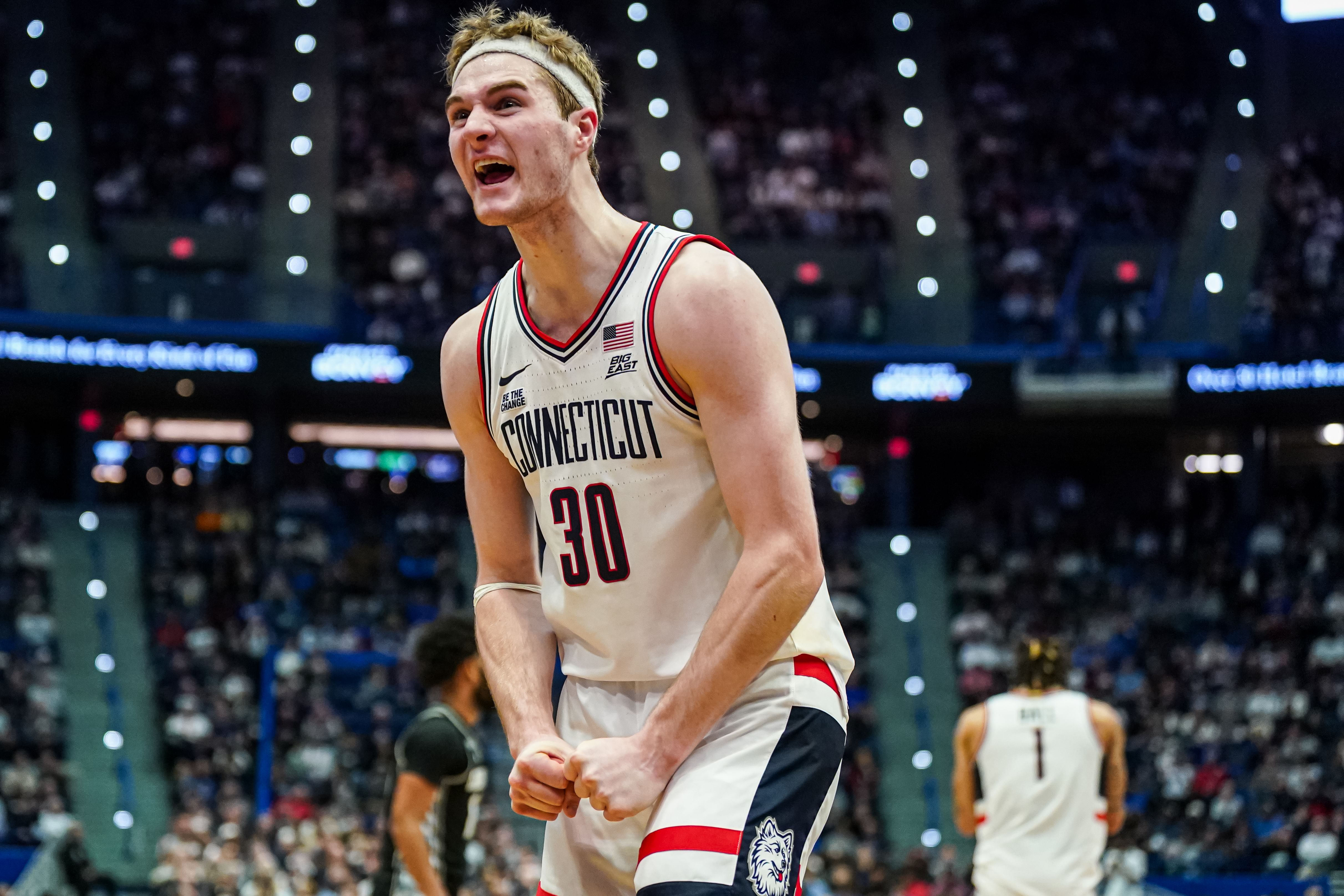 Connecticut Huskies forward Liam McNeeley (#30) reacts after a play against the Georgetown Hoyas in the second half of their NCAA basketball game at XL Center. Photo: Imagn