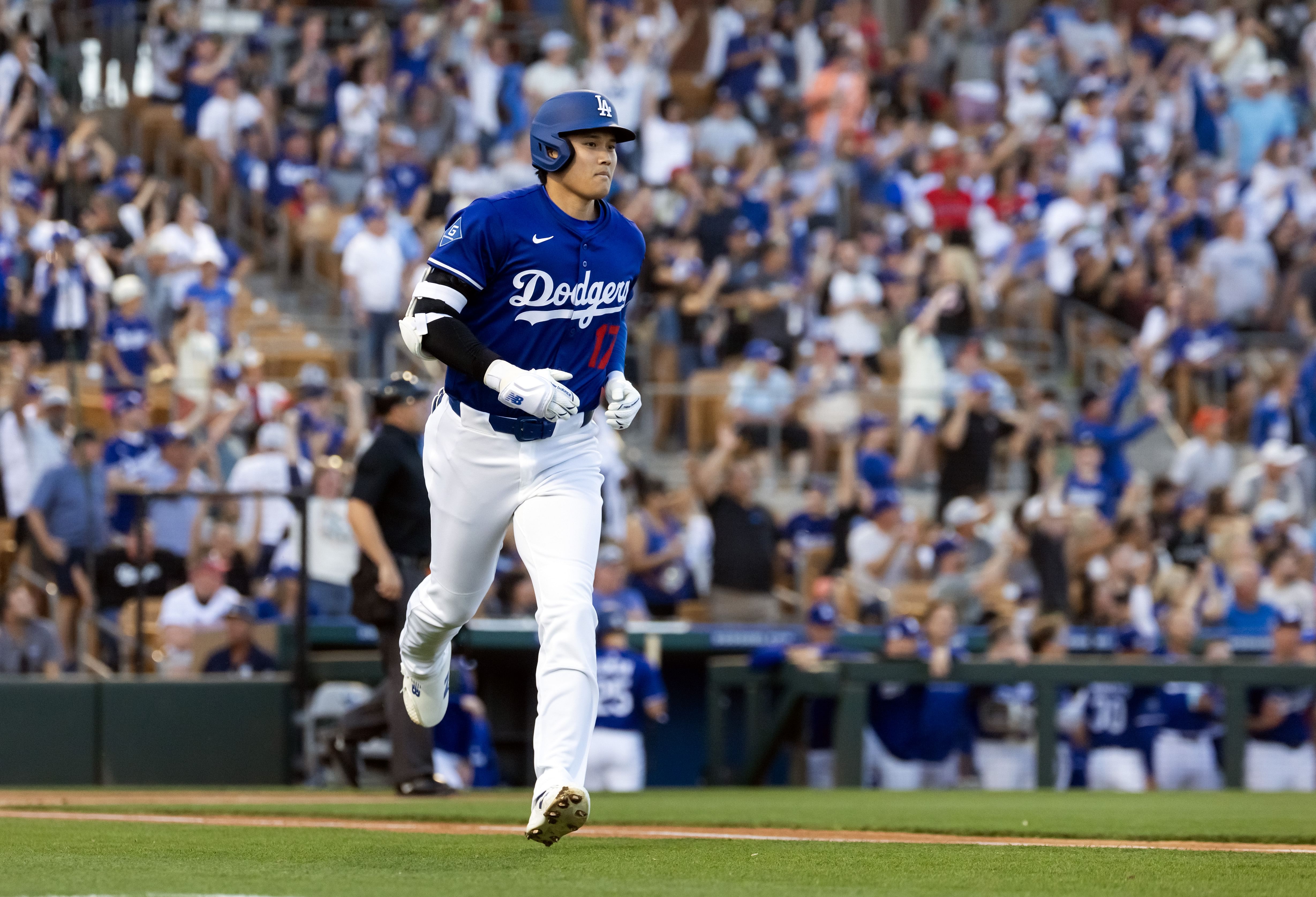 Shohei Ohtani hit a home run in his first spring training game for the Dodgers (Image Source: IMAGN)