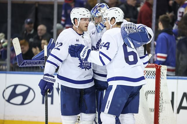 Feb 28, 2025; New York, New York, USA; Toronto Maple Leafs goaltender Anthony Stolarz (41) celebrates with defenseman Jake McCabe (22) and center David Kampf (64) after defeating the New York Rangers at Madison Square Garden. Mandatory Credit: Wendell Cruz-Imagn Images - Source: Imagn