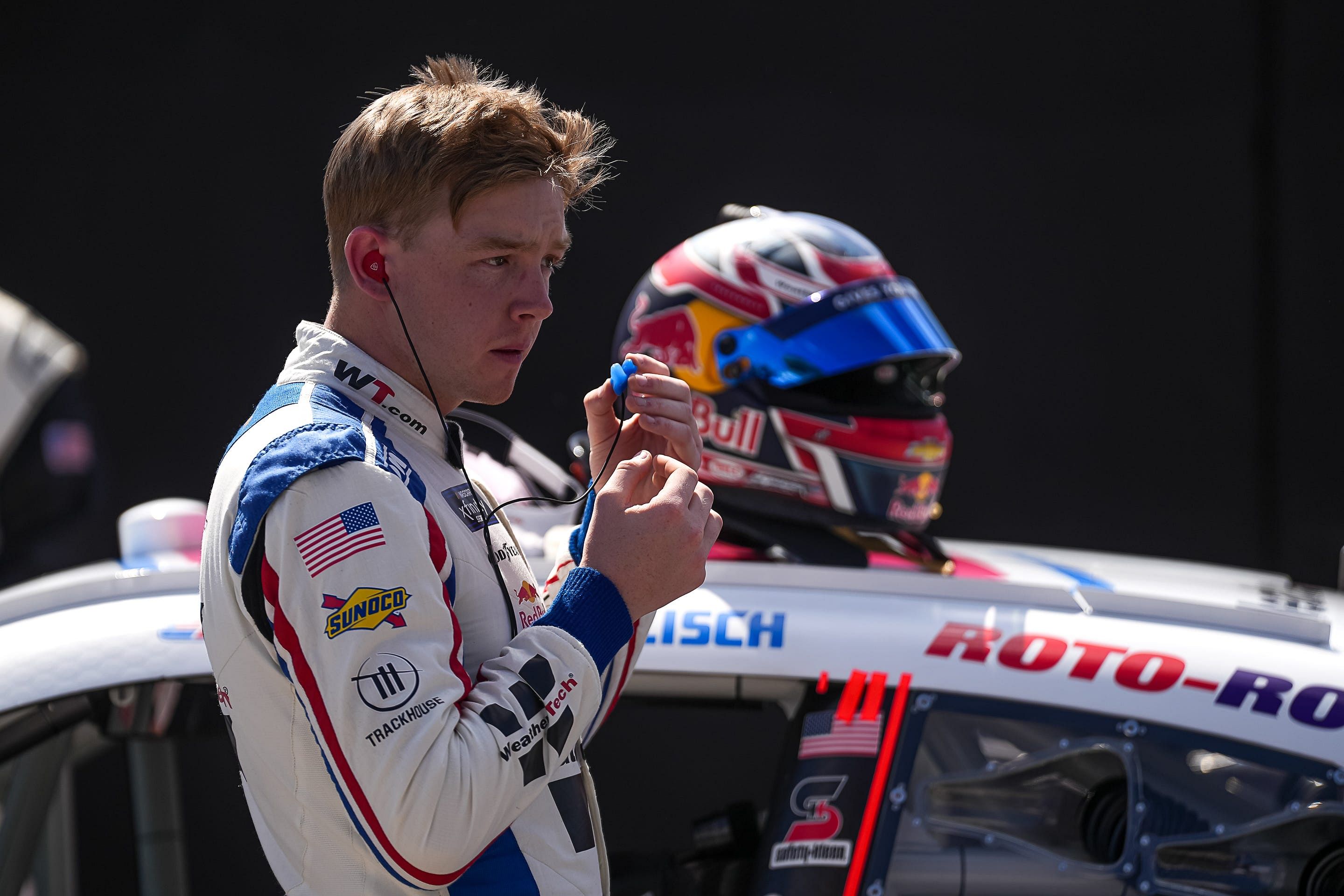 WeatherTech Chevrolet driver Connor Zilisch (88) puts in ear plugs ahead of the Focused Health 250 at COTA (Source: Imagn)