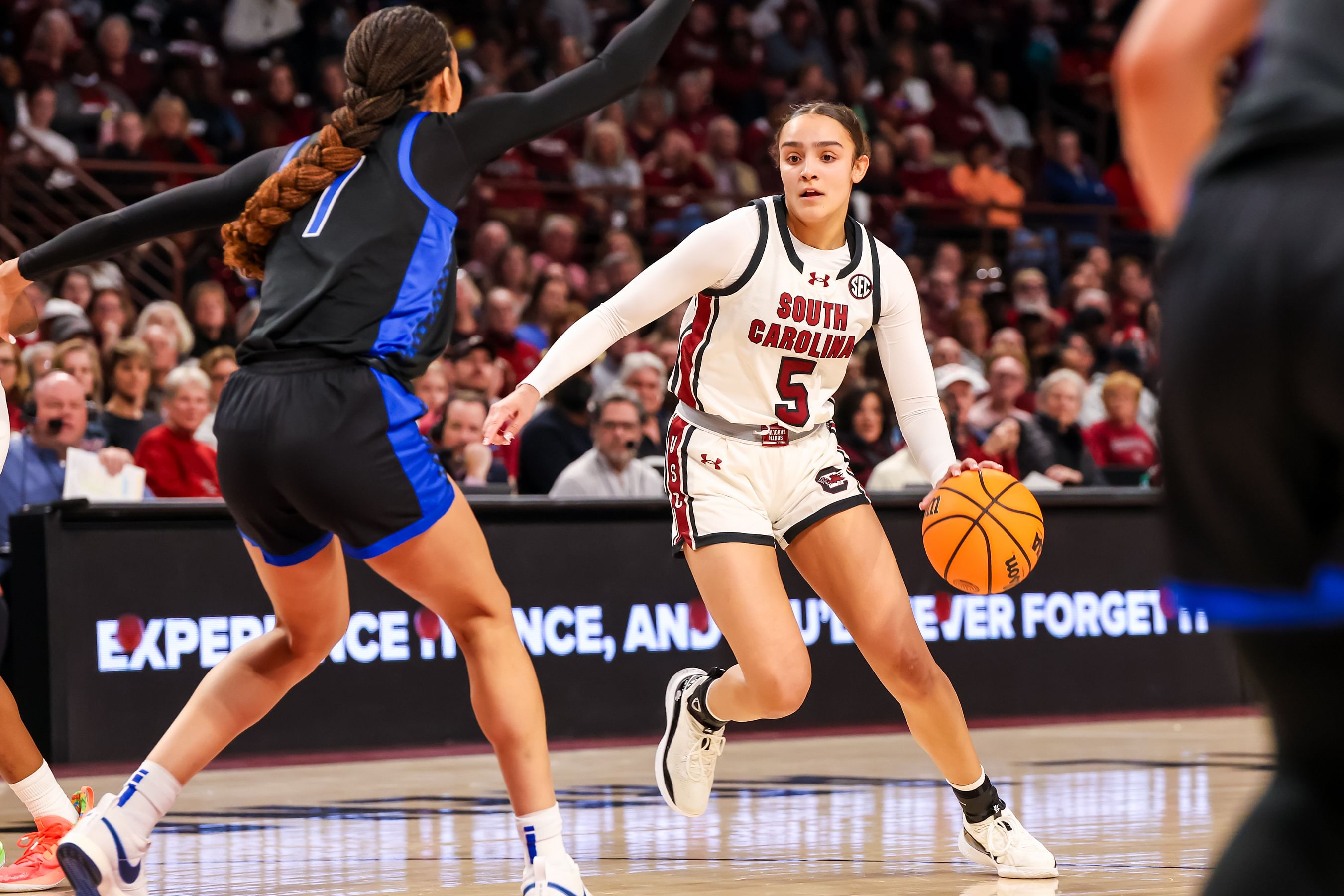 South Carolina Gamecocks guard Tessa Johnson (#5) attempts to drive around Kentucky Wildcats forward Teonni Key (#7) in the first half at Colonial Life Arena. Photo: Imagn