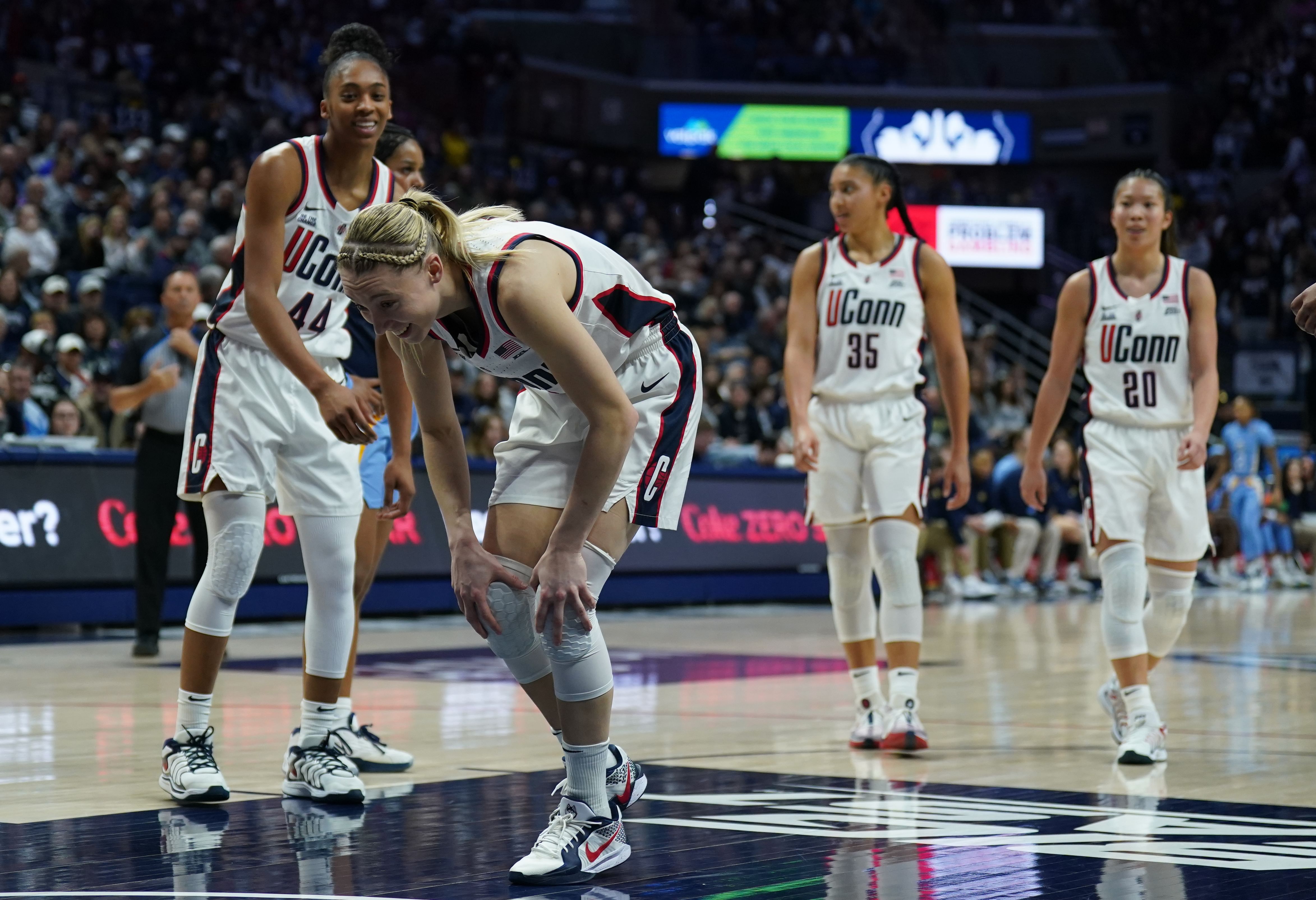 UConn Huskies guard Paige Bueckers (5) reacts after missing a free throw against the Marquette Golden Eagles - Source: Imagn