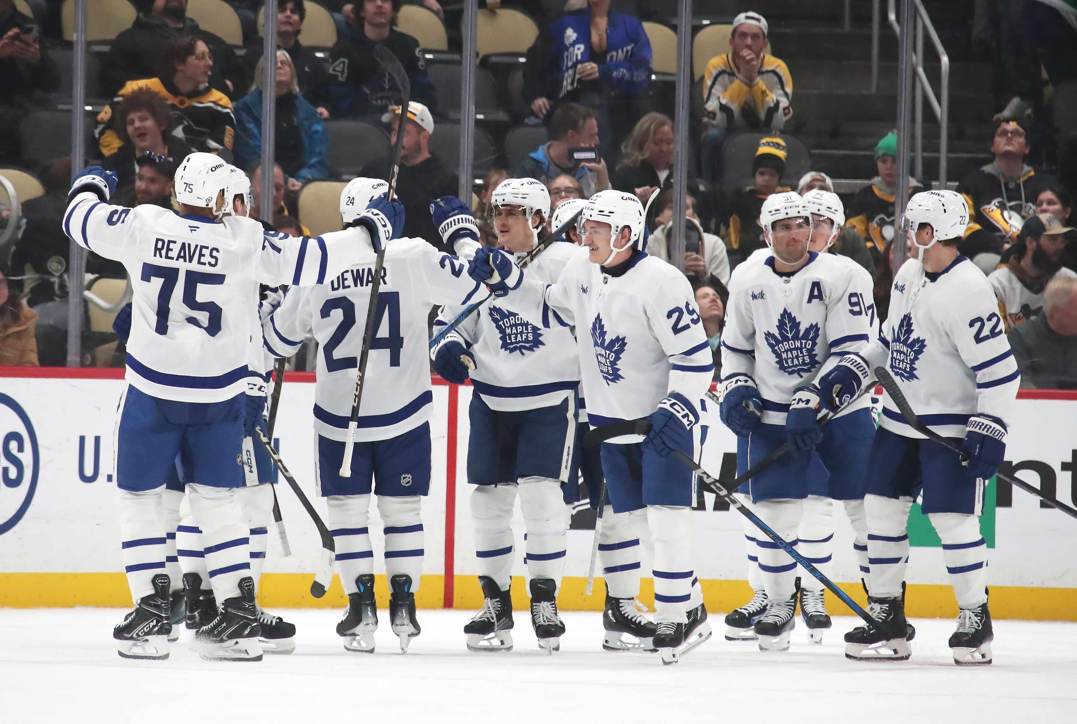 Mar 2, 2025; Pittsburgh, Pennsylvania, USA; The Toronto Maple Leafs celebrate after defeating the Pittsburgh Penguins in overtime at PPG Paints Arena. Mandatory Credit: Charles LeClaire-Imagn Images - Source: Imagn