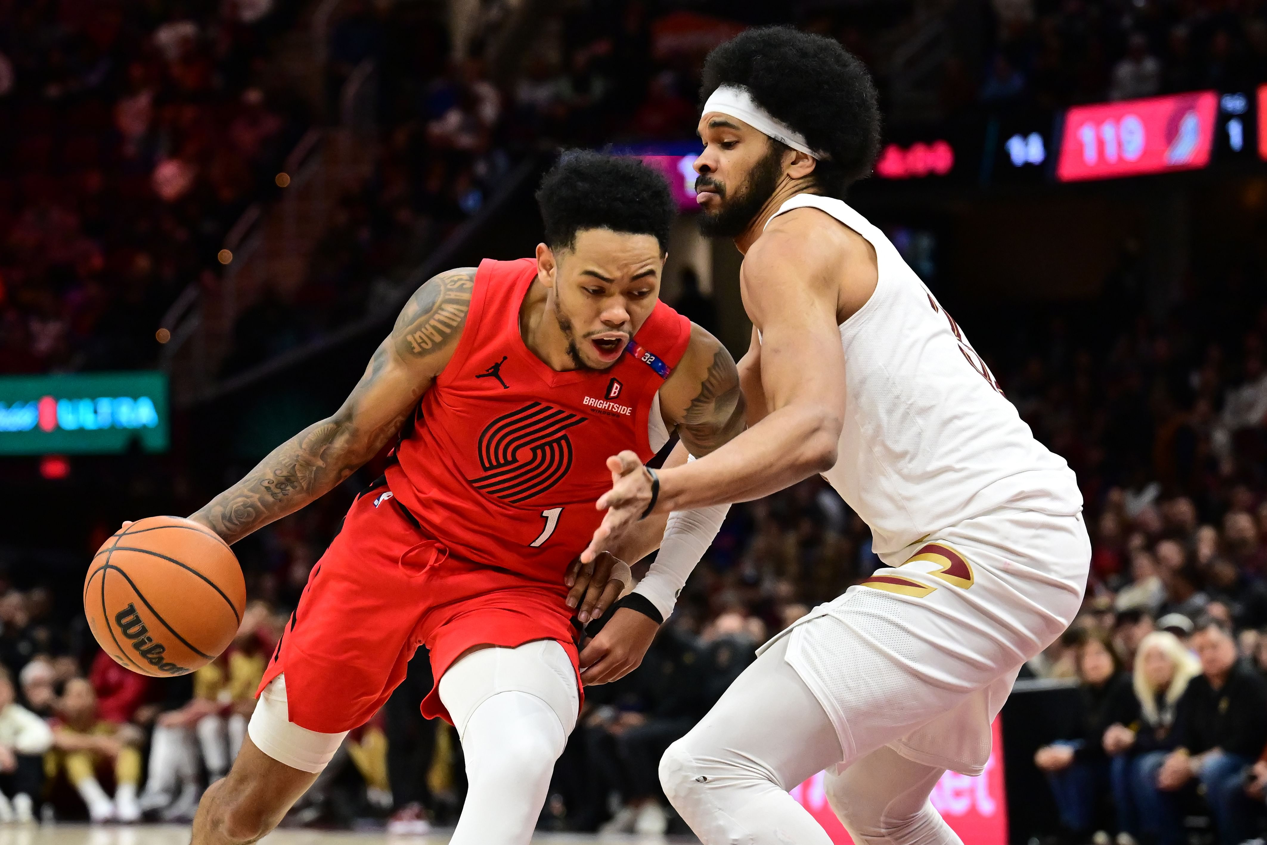 Portland Trail Blazers guard Anfernee Simons drives to the basket against Cleveland Cavaliers center Jarrett Allen at Rocket Arena. Photo Credit: Imagn