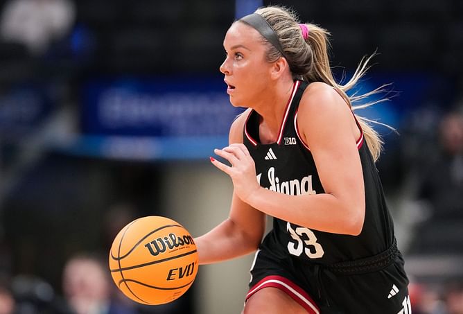 "I literally ran down your mom": Indiana star Sydney Parrish excitedly reacts to Iowa's Kylie Feuerbach cuddling her puppy