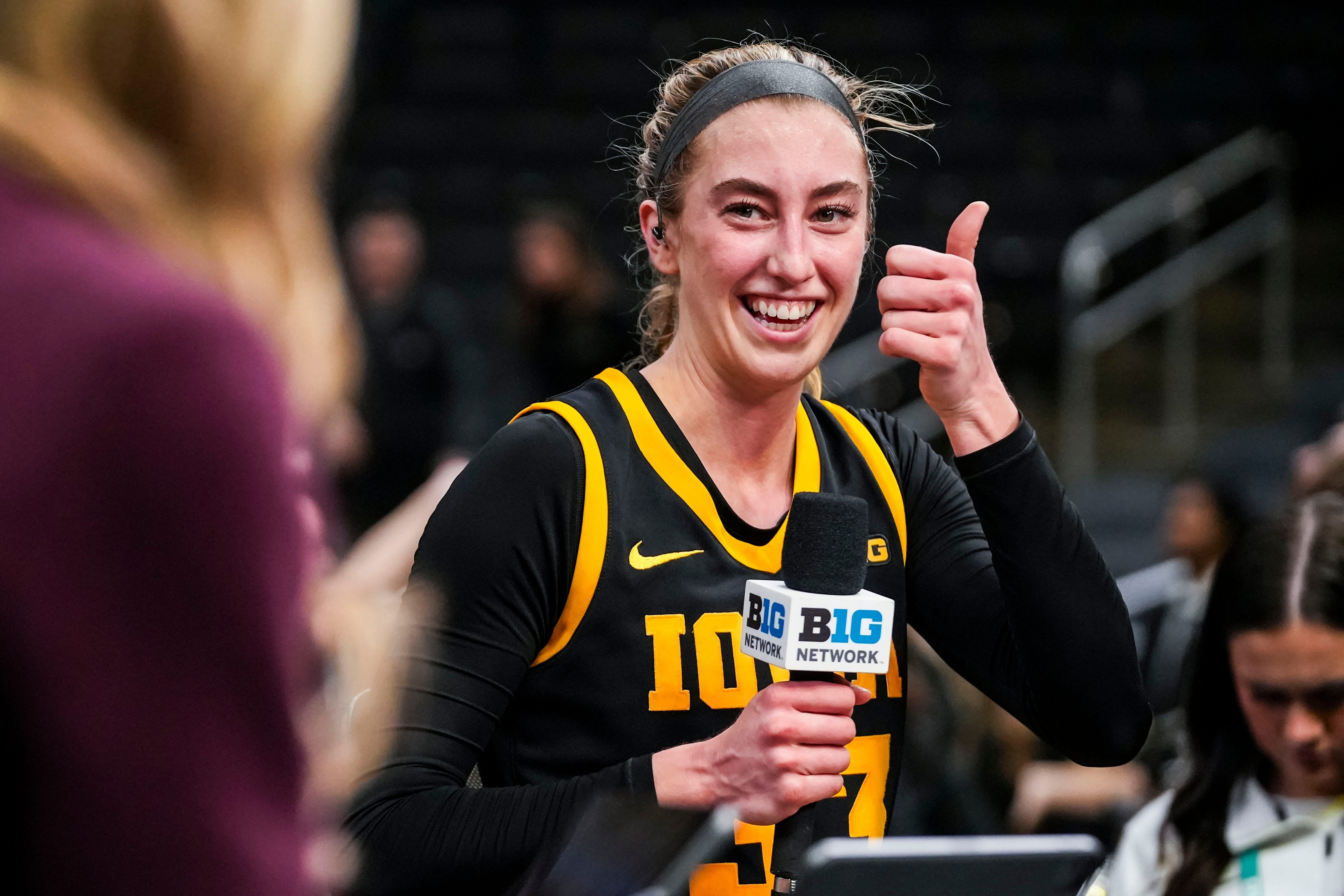 Iowa Hawkeyes guard Lucy Olsen (33) prepares for an interview on March 6, 2025. Photo: Imagn