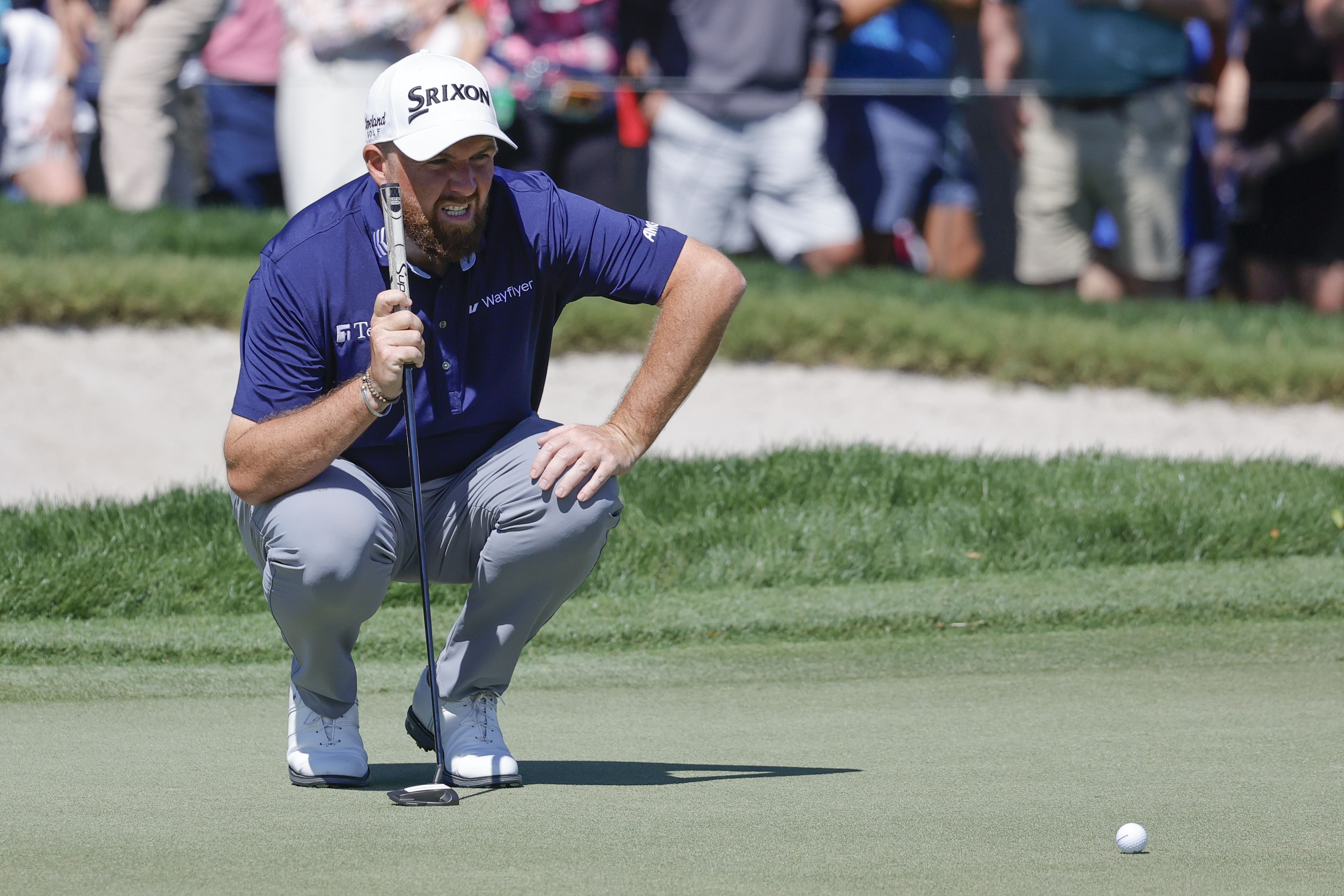 Shane Lowry lines up his putt on the ninth green during the second round of the Arnold Palmer Invitational - Source: Imagn