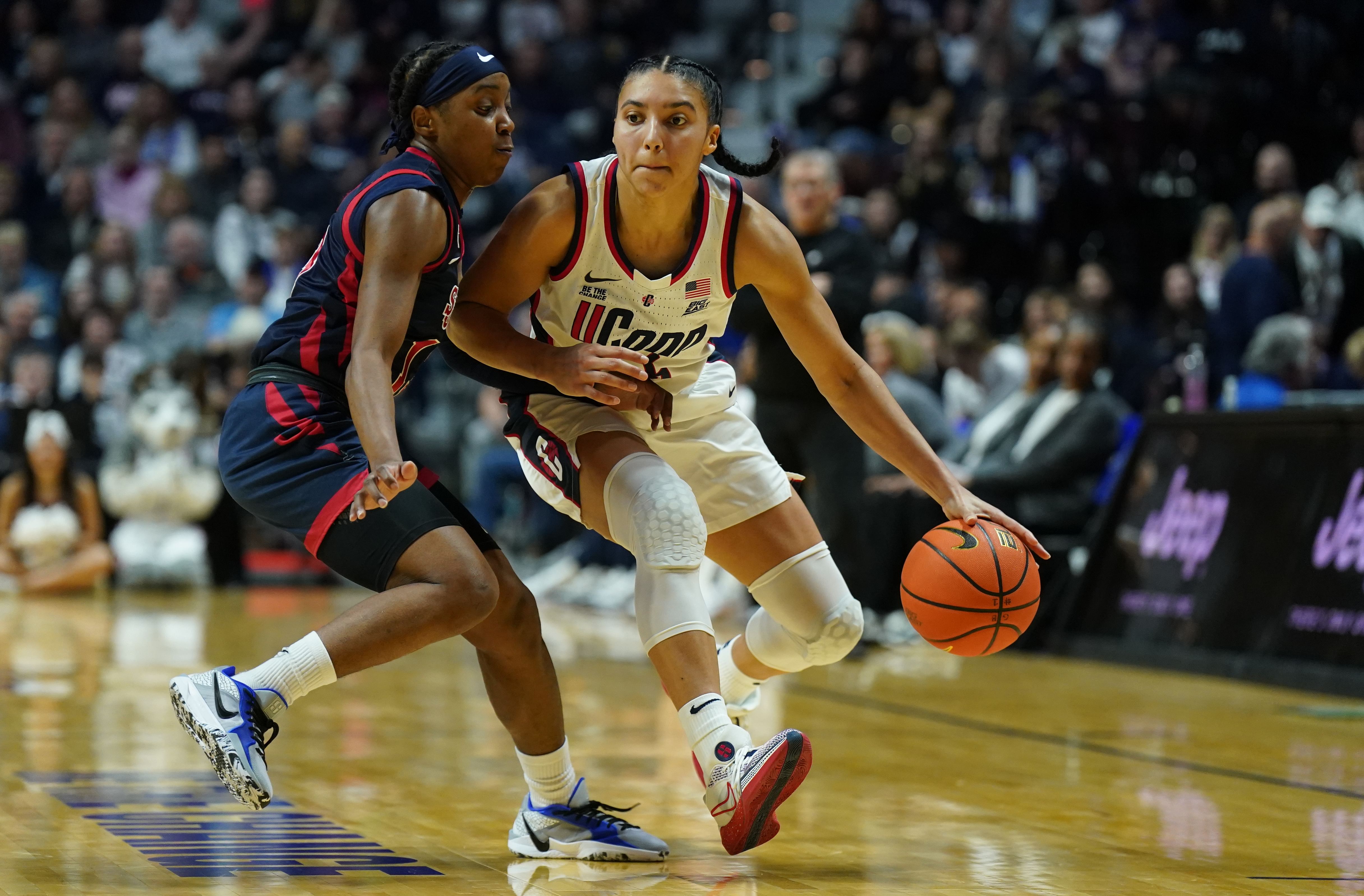 UConn Huskies guard Azzi Fudd (35) returns the ball against the St. John&#039;s Red Storm in the first half of their Big East Tournament quarterfinal clash at Mohegan Sun Arena. Photo: Imagn