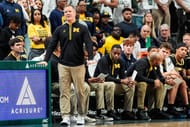 يتفاعل Dusty May مدرب ميشيغان في مسرحية ضد ميشيغان ستيت في الشوط الأول في مركز بريسلين في إيست لانسينج في 9 مارس 2025. الصورة: Imagn