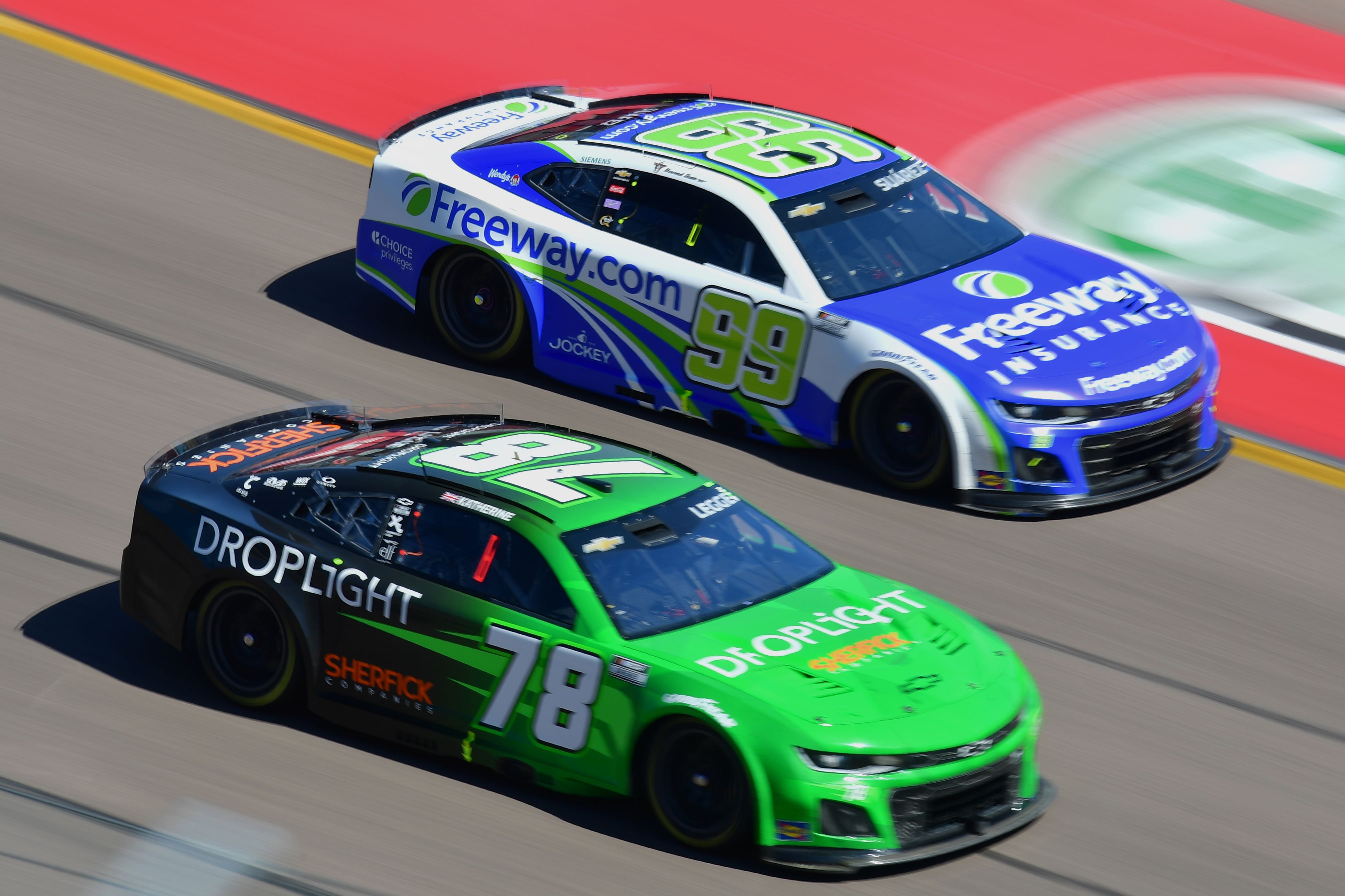 Daniel Suarez (99) driving alongside Katherine Legge (78) at Phoenix Raceway - Source: Imagn