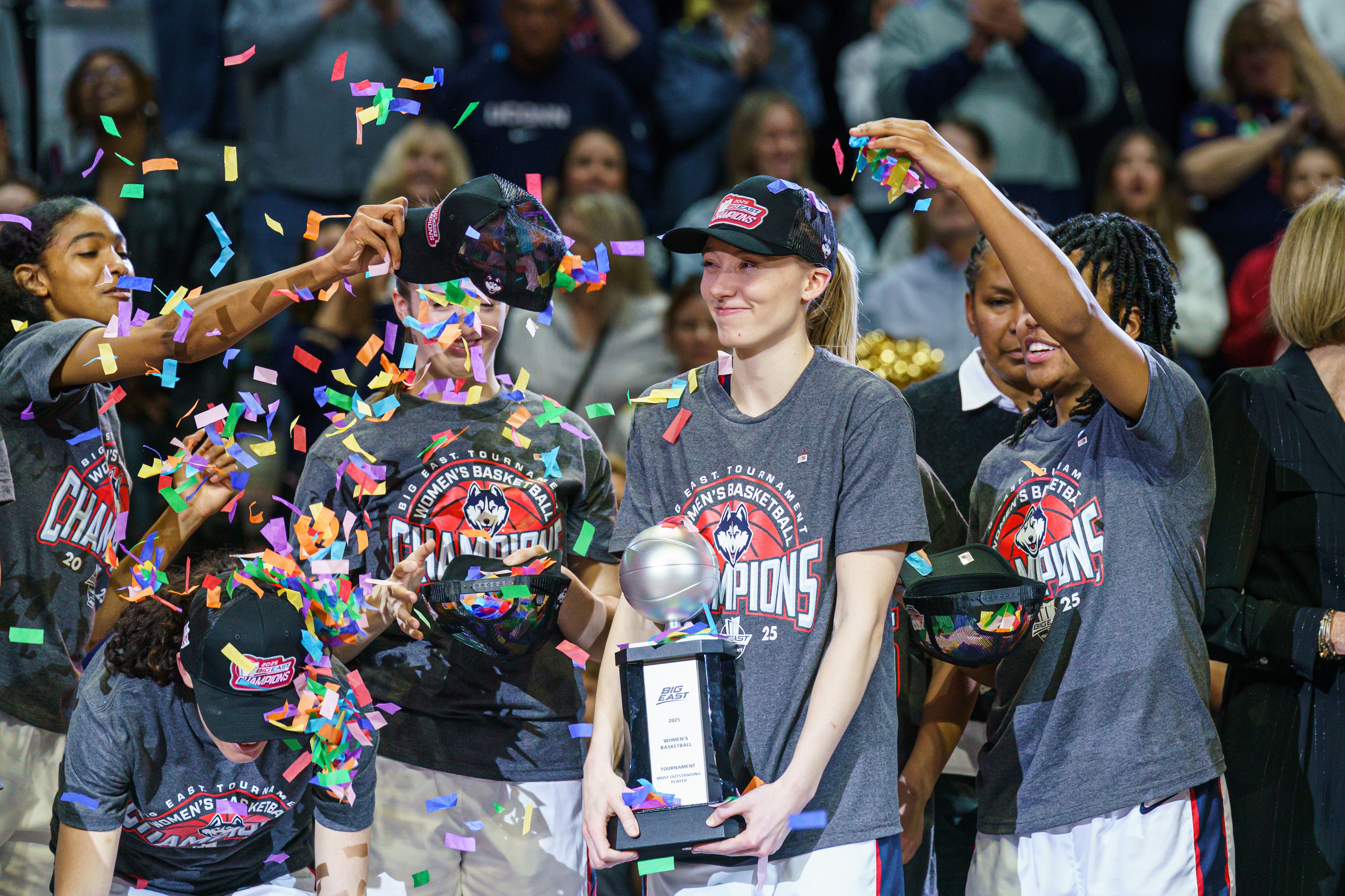 UConn Huskies guard Paige Bueckers (5) holds her &ldquo;Most Outstanding Player&rdquo; trophy as the team celebrates their Big East Championship win over the Creighton Bluejays. Photo: Imagn