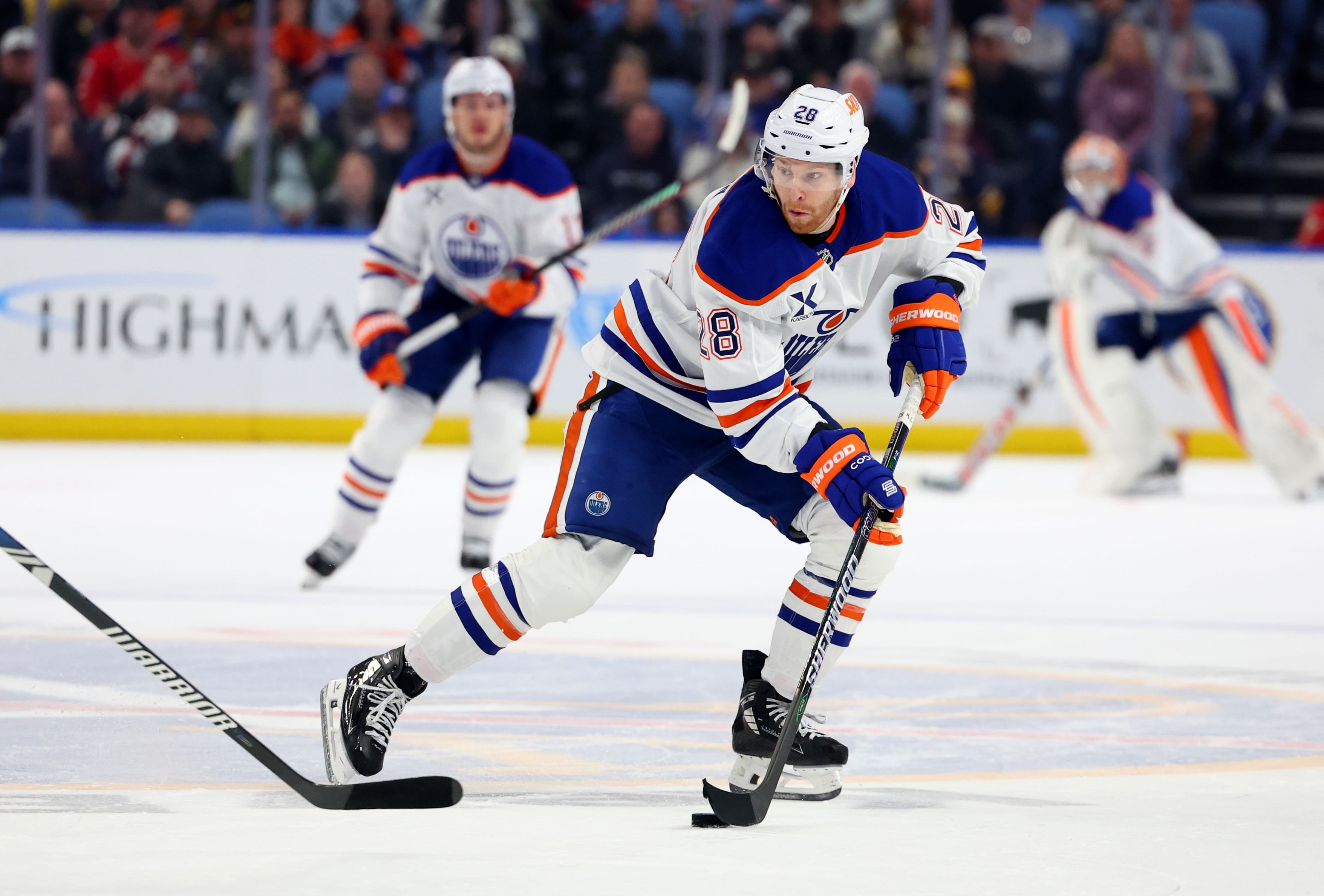 Mar 10, 2025; Buffalo, New York, USA; Edmonton Oilers right wing Connor Brown (28) looks to make a pass during the third period against the Buffalo Sabres at KeyBank Center. Mandatory Credit: Timothy T. Ludwig-Imagn Images - Source: Imagn