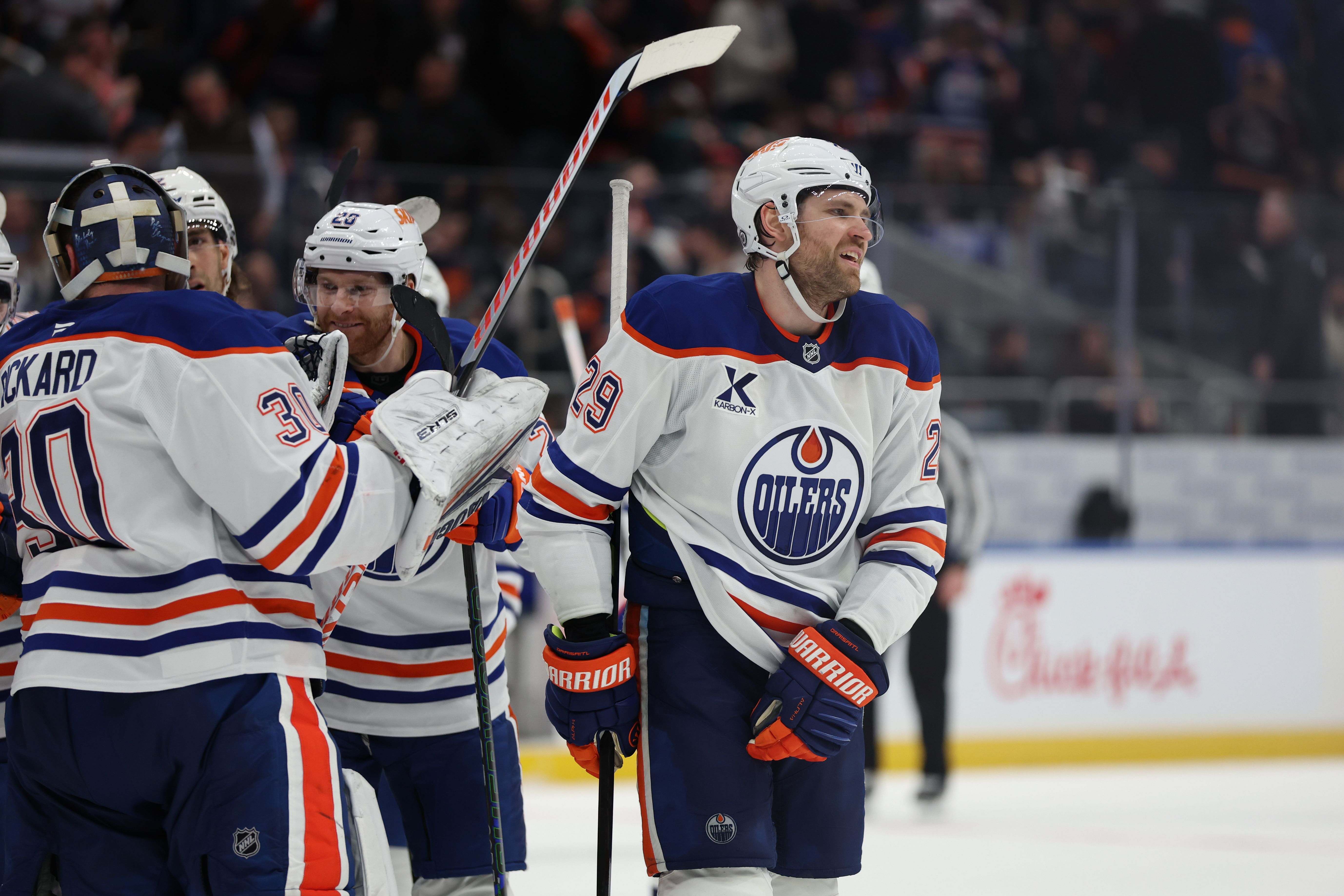 Mar 14, 2025; Elmont, New York, USA; Edmonton Oilers center Leon Draisaitl (29) celebrates the game winning goal after overtime against the New York Islanders at UBS Arena. Mandatory Credit: Thomas Salus-Imagn Images - Source: Imagn