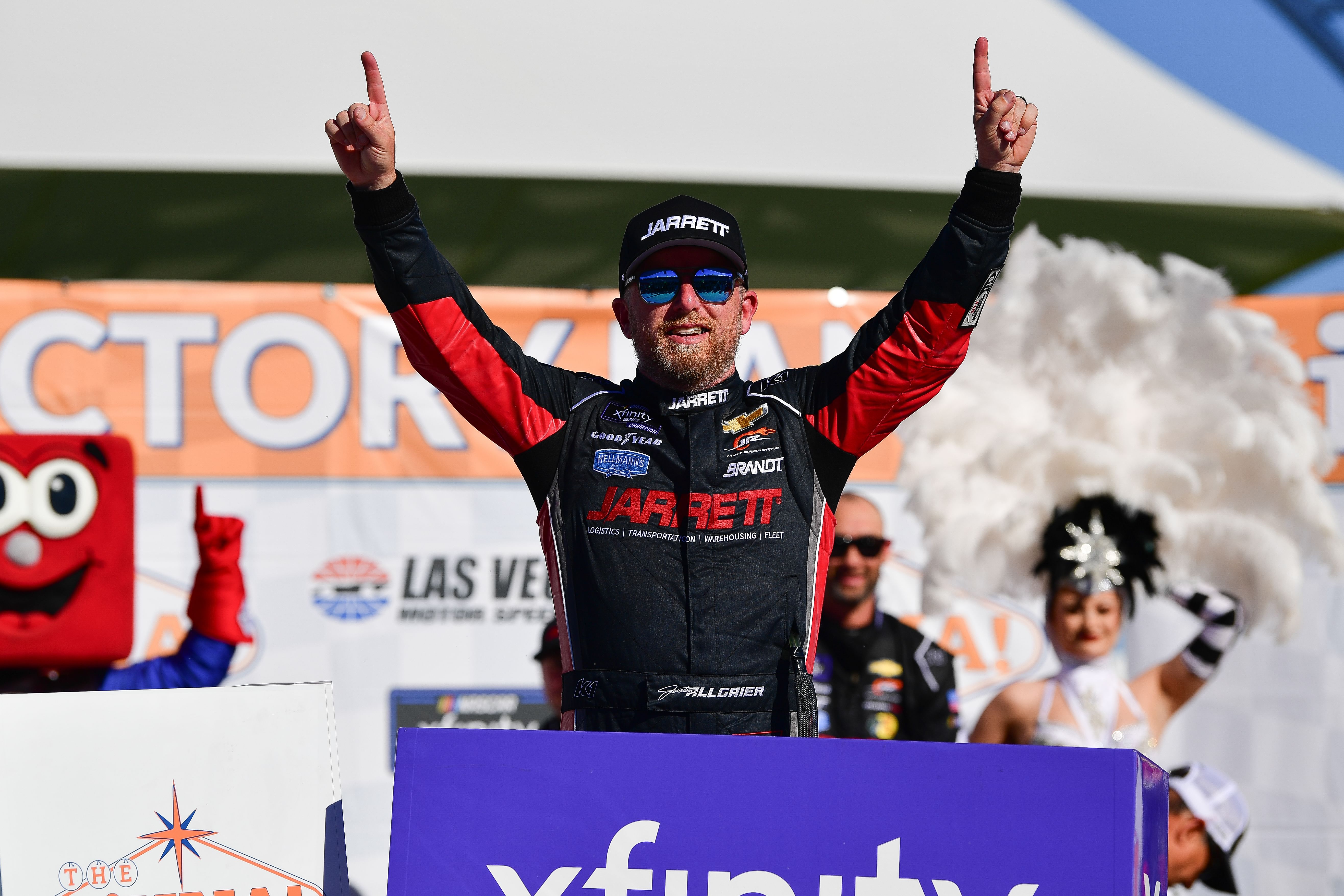 Mar 15, 2025; Las Vegas, Nevada, USA; NASCAR Xfinity Series driver Justin Allgaier (7) celebrates his victory of The LiUNA! race at Las Vegas Motor Speedway. Mandatory Credit: Gary A. Vasquez-Imagn Images - Source: Imagn