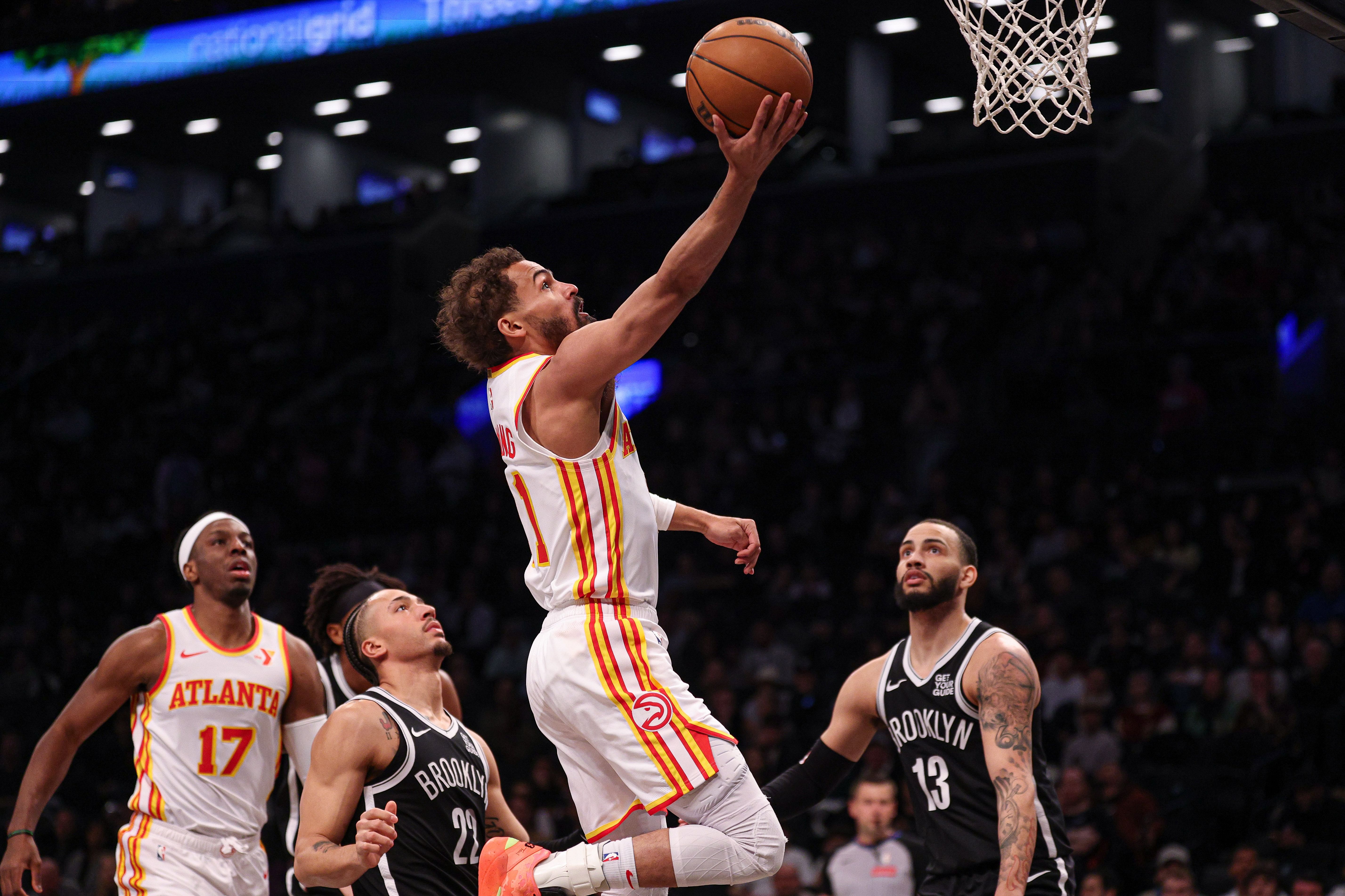 Atlanta Hawks guard Trae Young goes to the basket against the Brooklyn Nets at Barclays Center. Photo Credit: Imagn