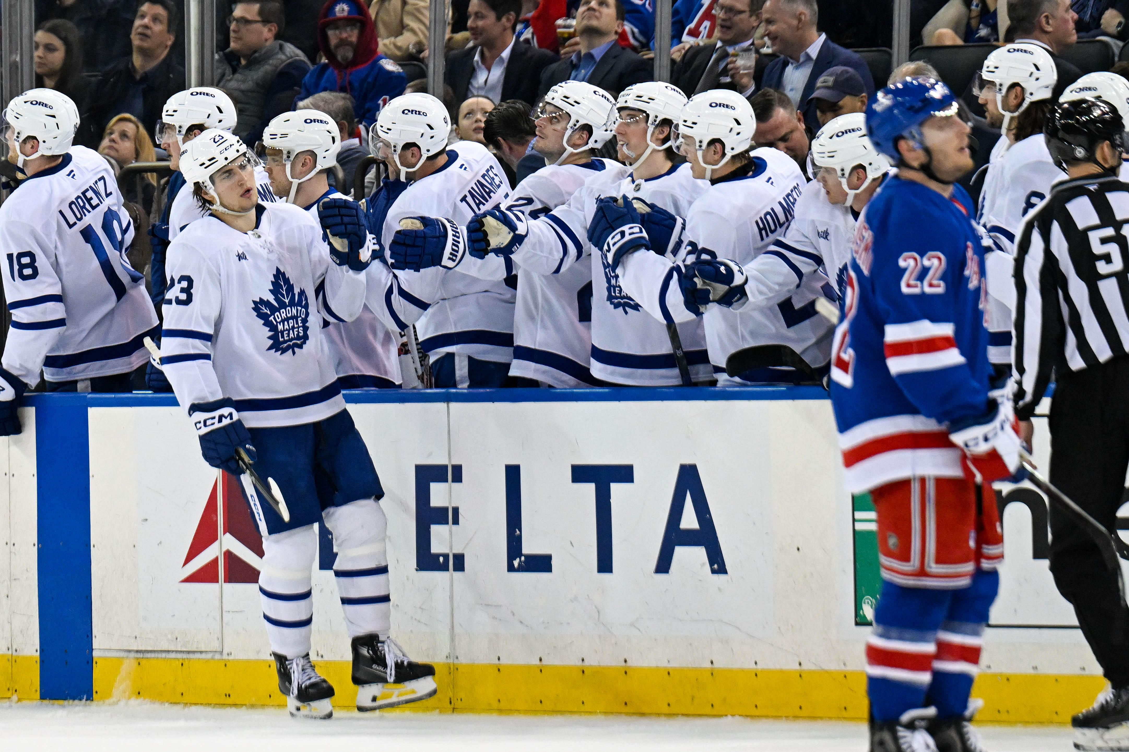 Mar 20, 2025; New York, New York, USA; Toronto Maple Leafs left wing Matthew Knies (23) celebrates his goal against the New York Rangers during the second period at Madison Square Garden. Mandatory Credit: Dennis Schneidler-Imagn Images - Source: Imagn