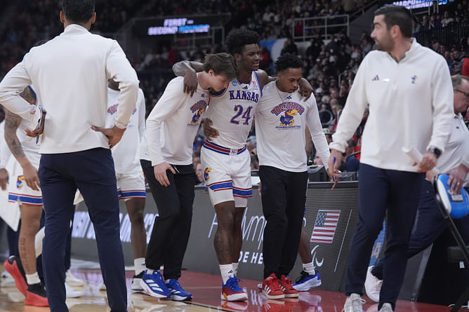 "F***in brutal end to his Kansas career", "Absolutely heartbreaking": Fans lament with Kansas after KJ Adams' Achilles injury during Arkansas upset
