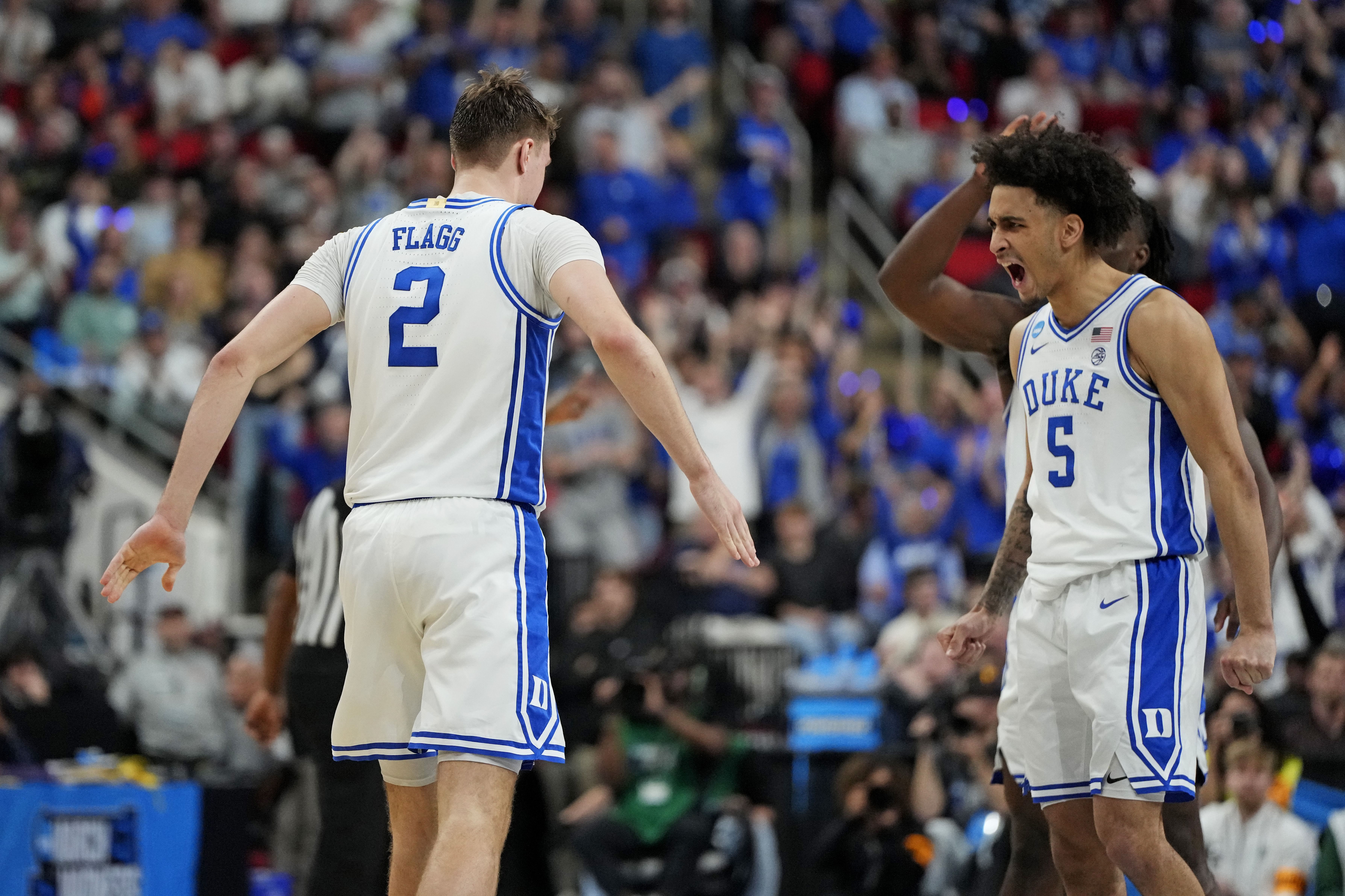 Duke Blue Devils forward Cooper Flagg celebrates with teammate Tyrese Proctor (#5) during the first half against the Baylor Bears in the second round of the NCAA Tournament at Lenovo Center. Photo: Imagn