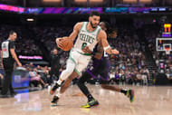 Boston Celtics forward Jayson Tatum spins past Sacramento Kings guard Keon Ellis at the Golden 1 Center. Photo Credit: Imagn