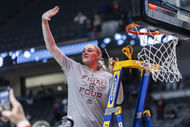 South Carolina forward Chloe Kitts waves to fans after she cuts the net after the Gamecocks defeated the Duke Blue Devils in their Elite Eight clash at Legacy Arena. Photo: Imagn