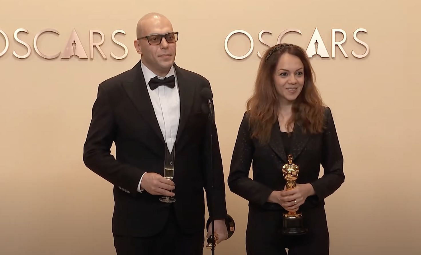 Shirin Sohani and Hossein Molayemi, winners of the Best Animated Short Film (Image via Oscars/YouTube)