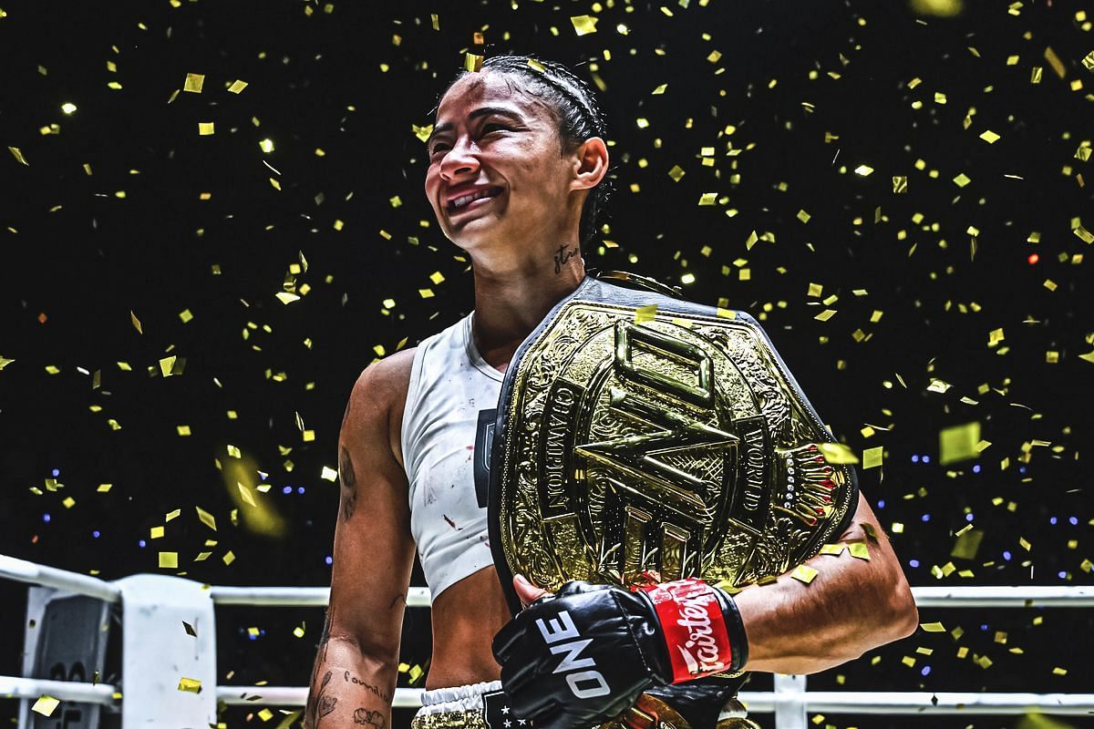 Allycia Hellen Rodrigues thrilled to make successful title defense and win $50,000 bonus. -- Photo by ONE Championship