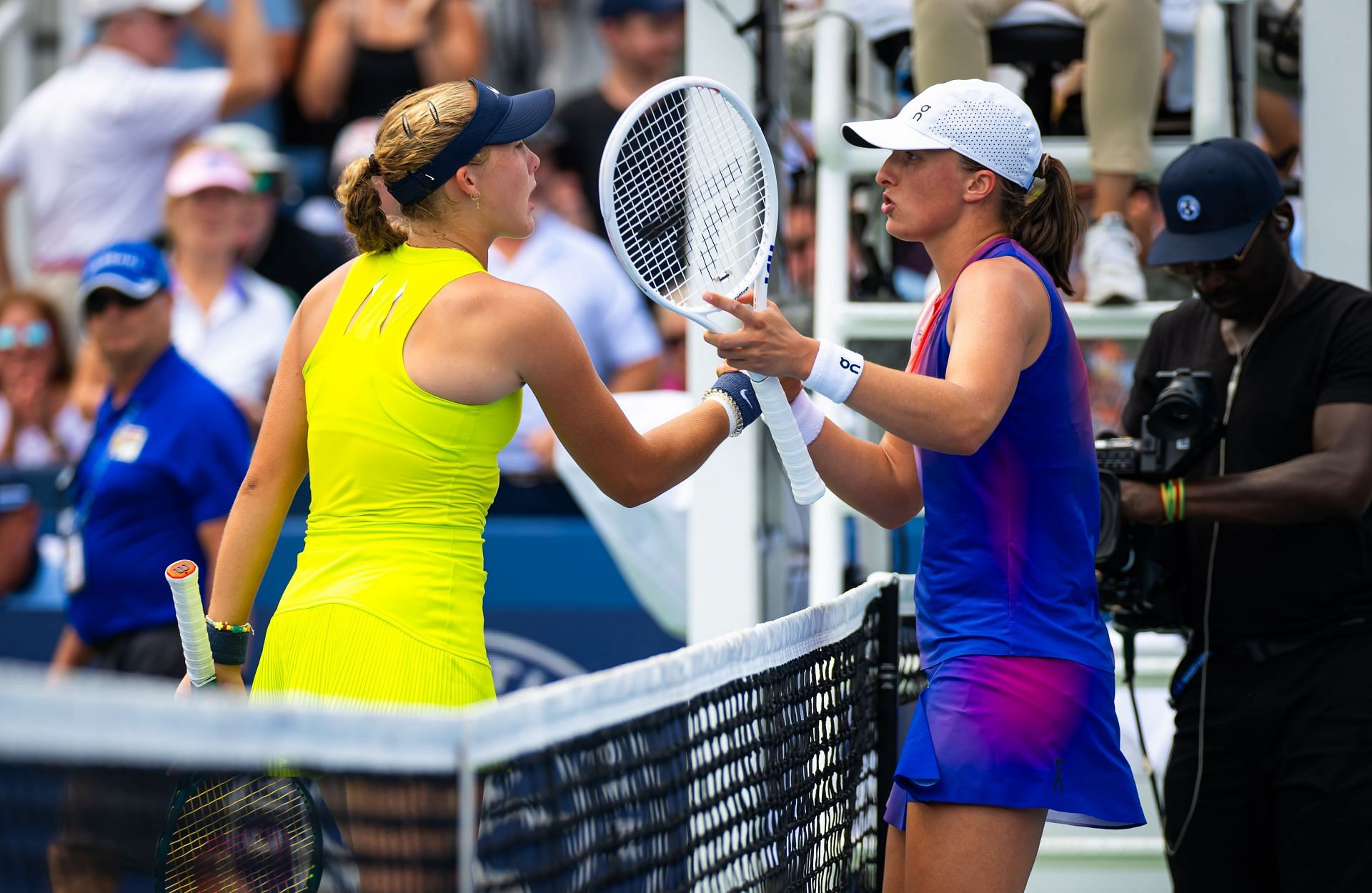 In Picture: Mirra Andreeva (L) and Iga Swiatek (R) (Getty)