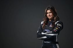 HMD Motorsports racer Hailie Deegan keeps it basic in white t-shirt and cargo jeans at 'St. Pete track walk day '