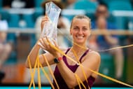 Petra Kvitova of the Czech Republic poses with the champions trophy after defeating Elena Rybakina of Kazakhstan in the womens singles final. - Source: Getty