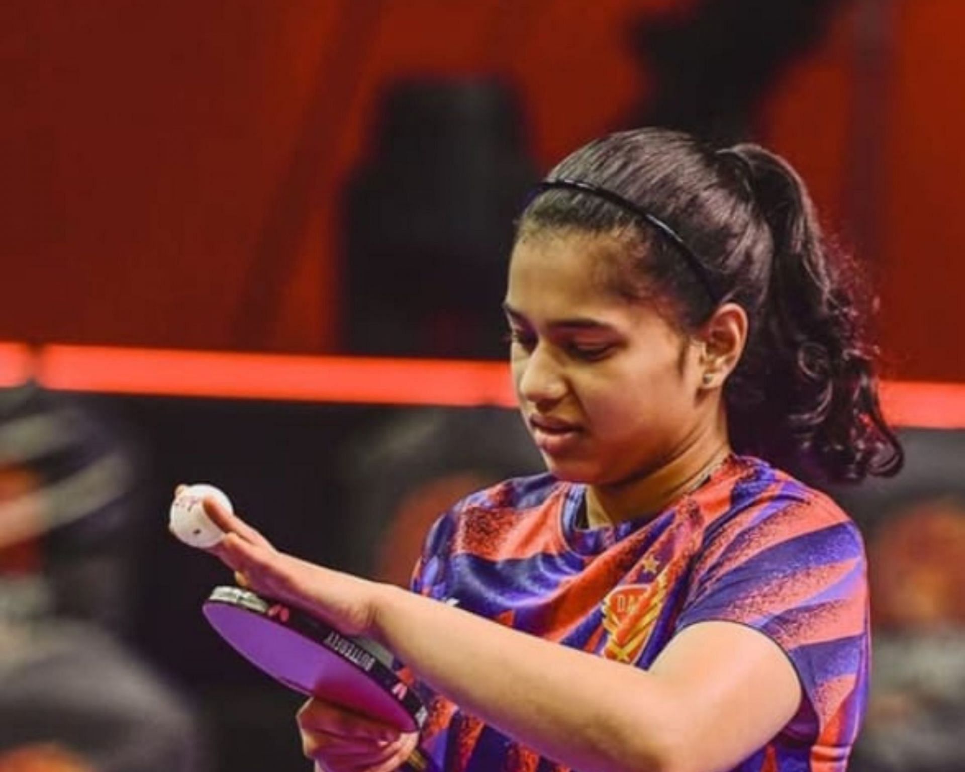 Diya at action during the Ultimate Table Tennis event