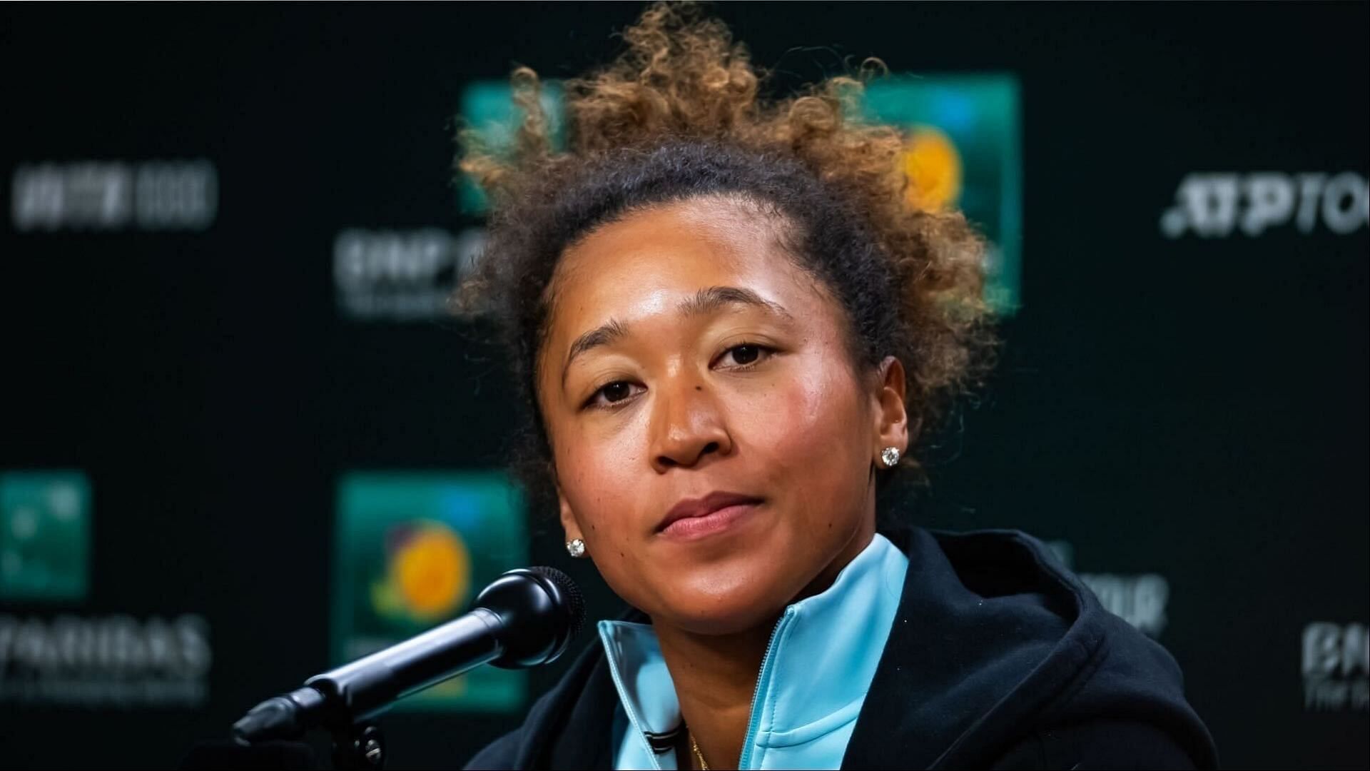 Naomi Osaka talking at a press conference - Source: Getty