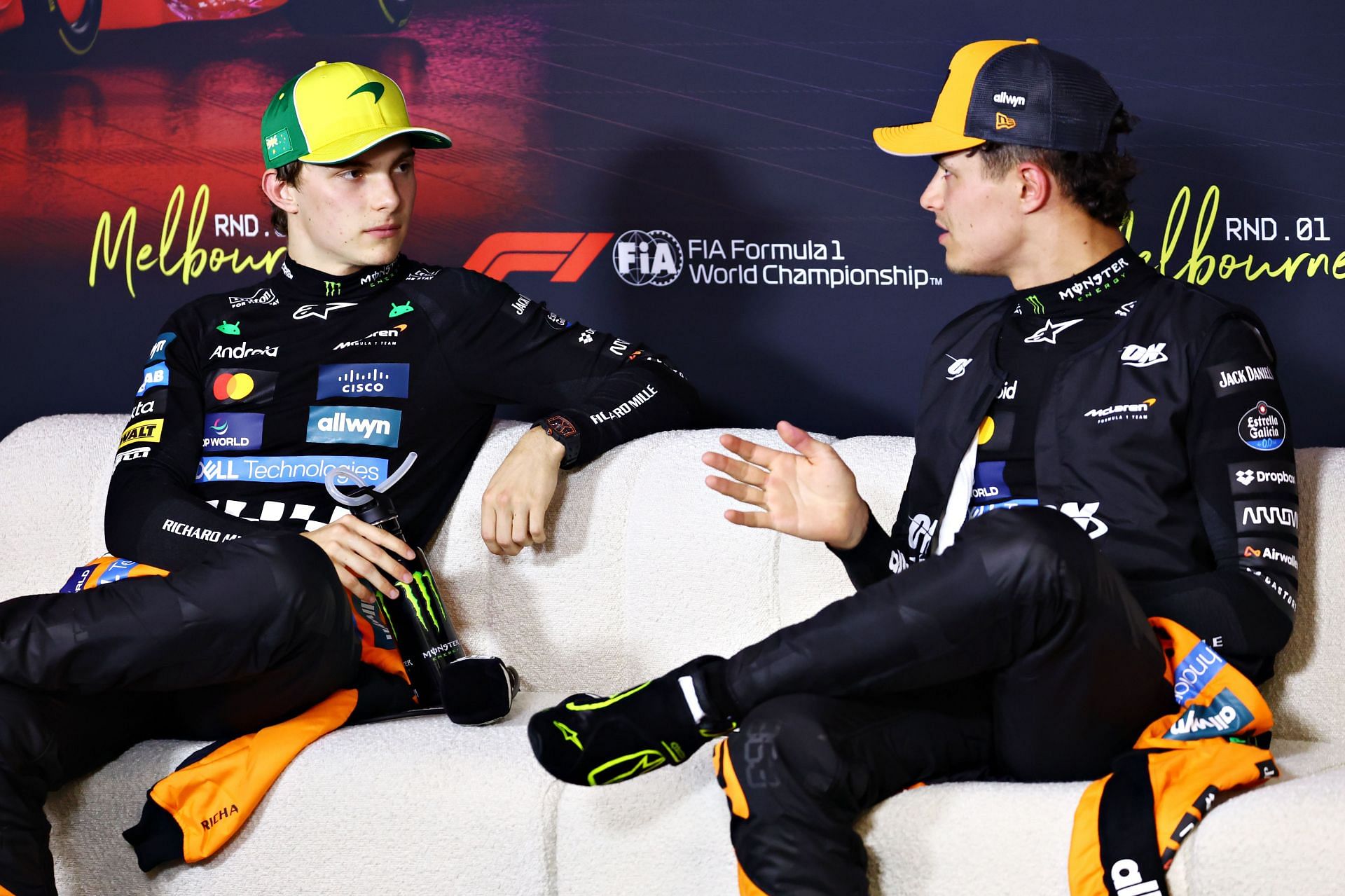 Oscar Piastri and Lando Norris of McLaren talk in the Drivers Press Conference - Source: Getty