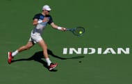 Draper plays a running forehand in the BNP Paribas Open - Source: Getty