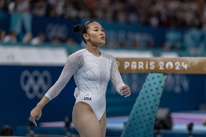 Suni Lee drops 2 word emotional reaction as fan reflects on the gymnast's struggles