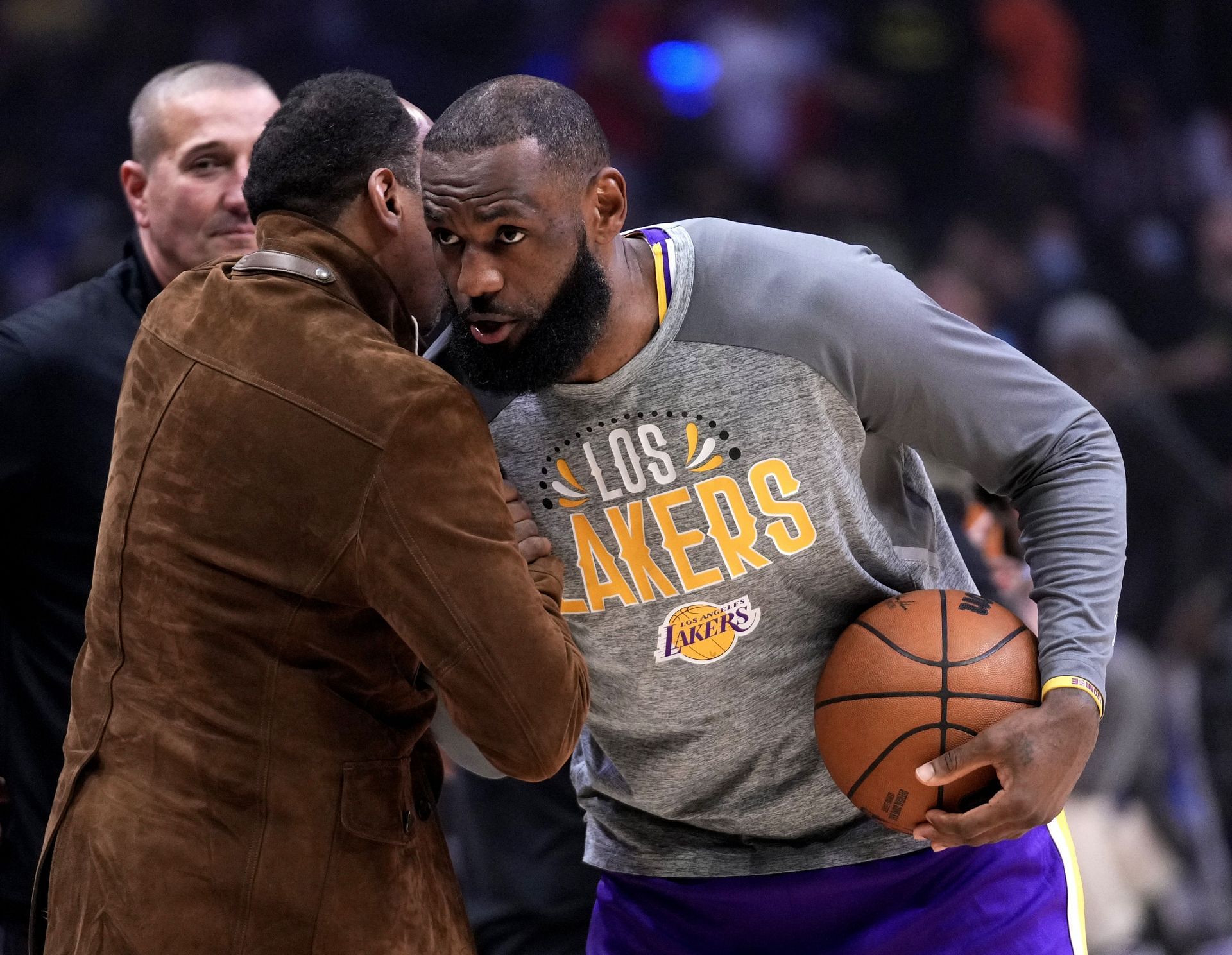 LeBron James and Stephen A. Smith dapping each other up in 2022 - Source: Getty