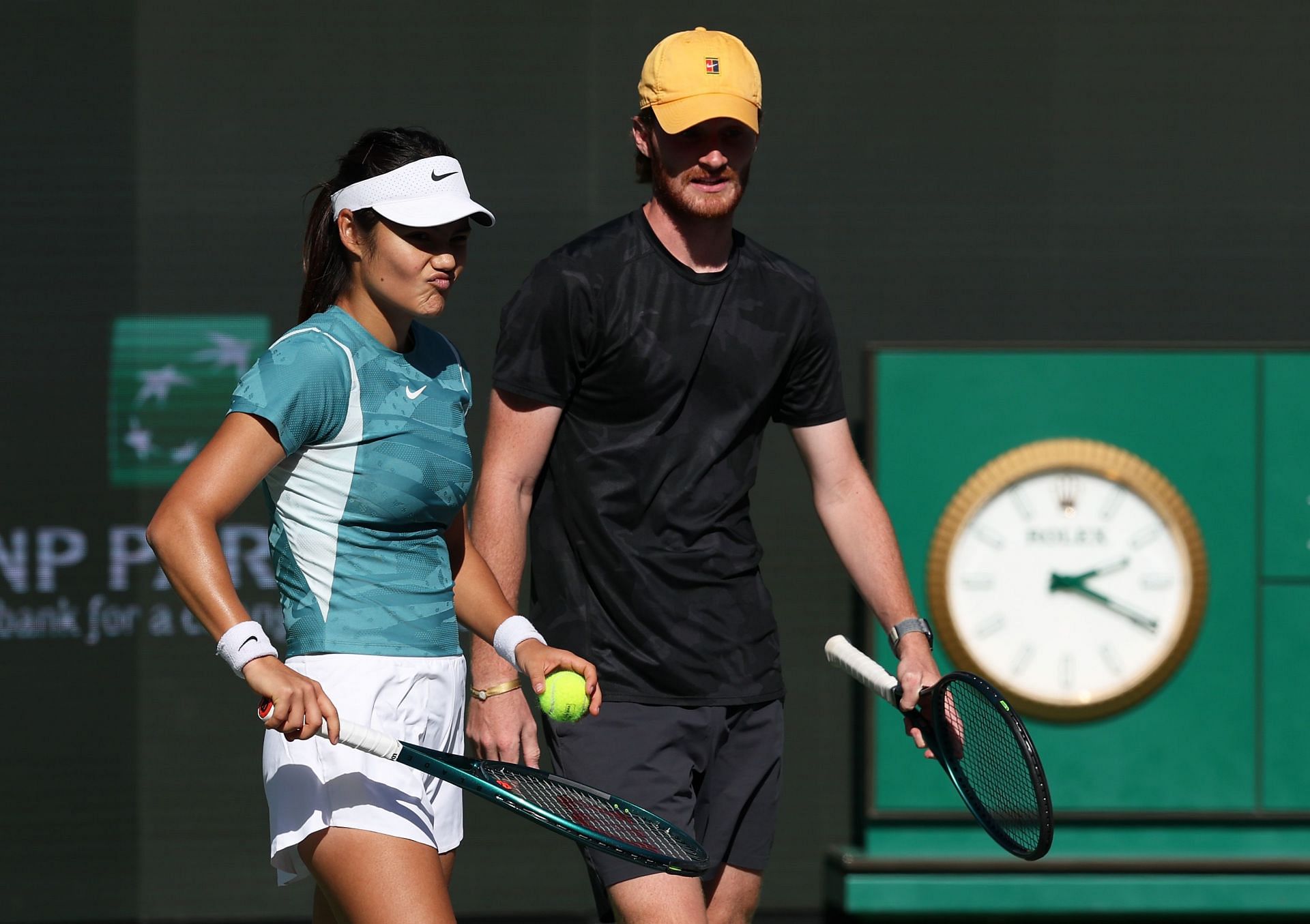 Raducanu pictured with her interim coach Tom Welsh at the 2025 BNP Paribas Open in Indian Wells - Image Source: Getty