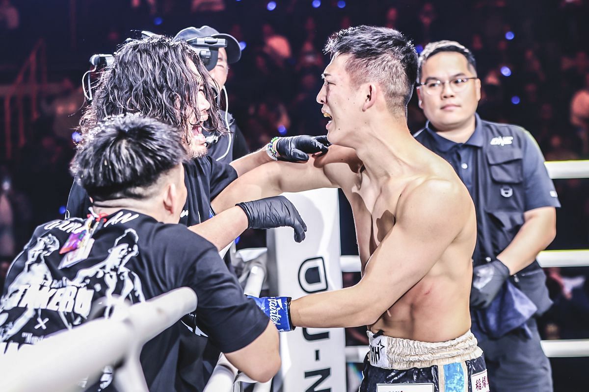 Masaaki Noiri celebrating winning the ONE interim featherweight kickboxing world championship at ONE 172. [Photo via: ONE Championship]