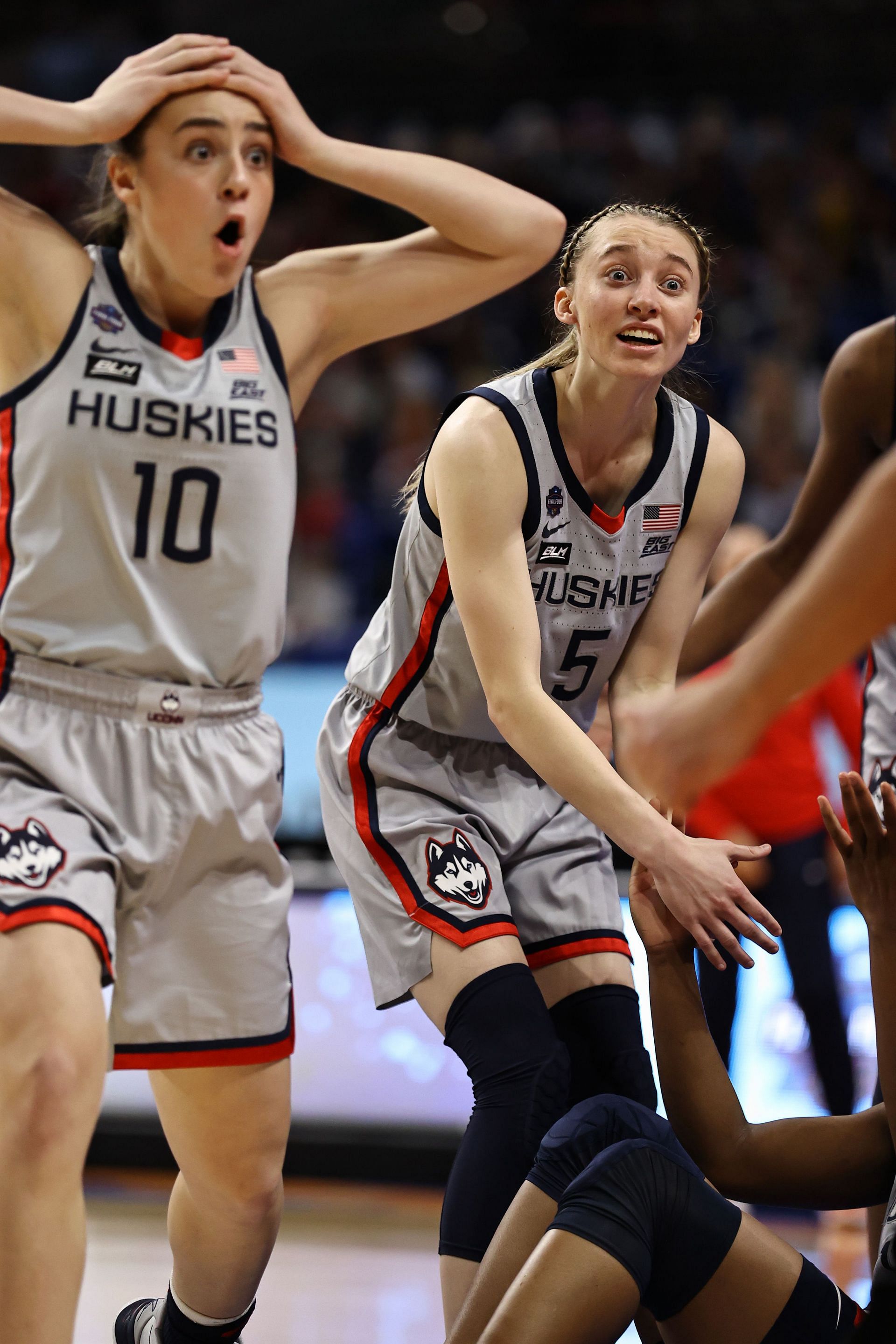  Paige Bueckers #5 of the UConn Huskies and Nika Muhl #10 react after a foul called on Christyn Williams #13 against the Arizona Wildcats during the third quarter in the Final Four semifinal game of the 2021 NCAA Women&#039;s Basketball Tournament at the Alamodome on April 02, 2021 - Source: Getty