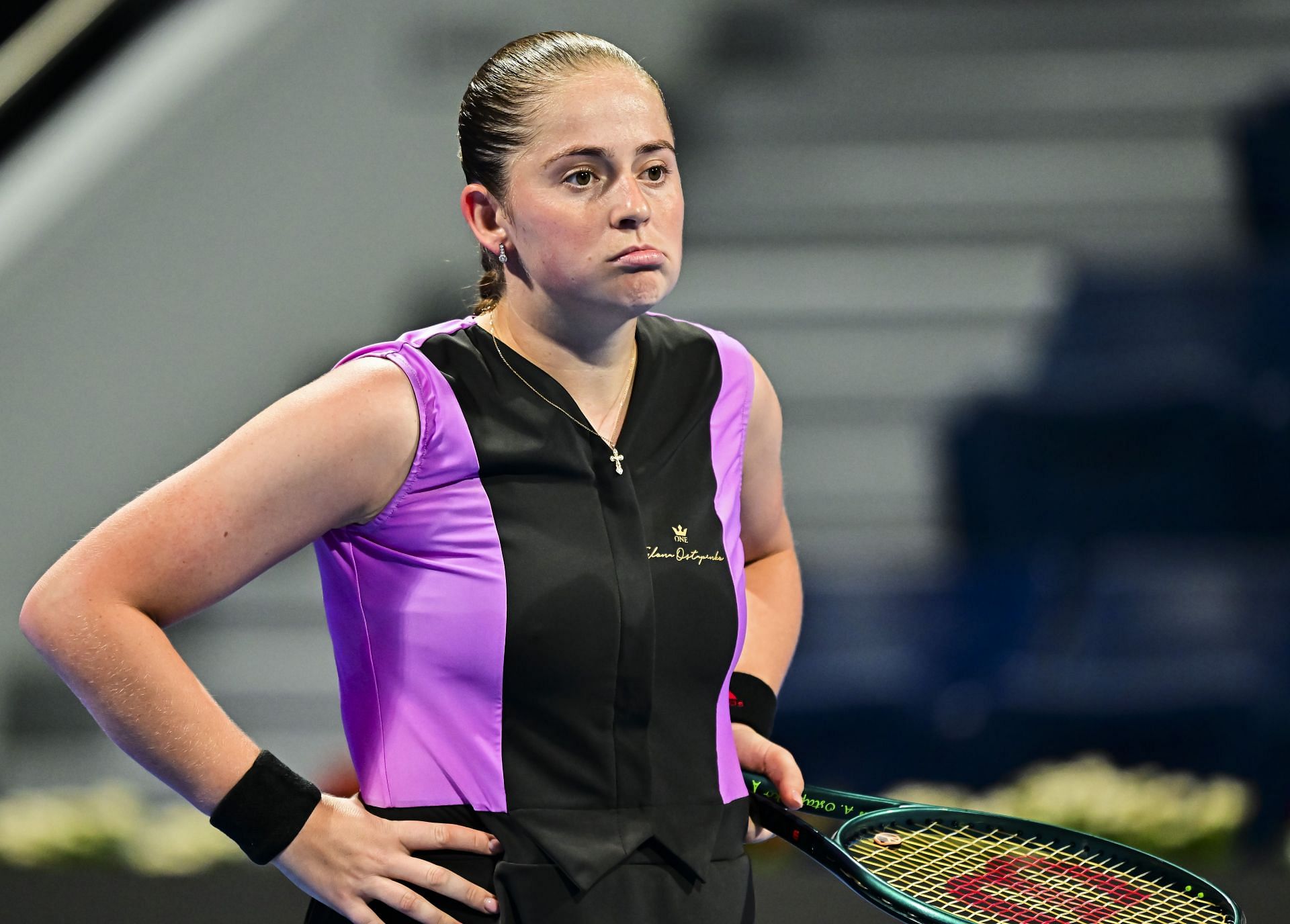 Jelena Ostapenko reacts during her first-round match against Victoria Azarenka at the 2024 Qatar TotalEnergies Open (Source: Getty)