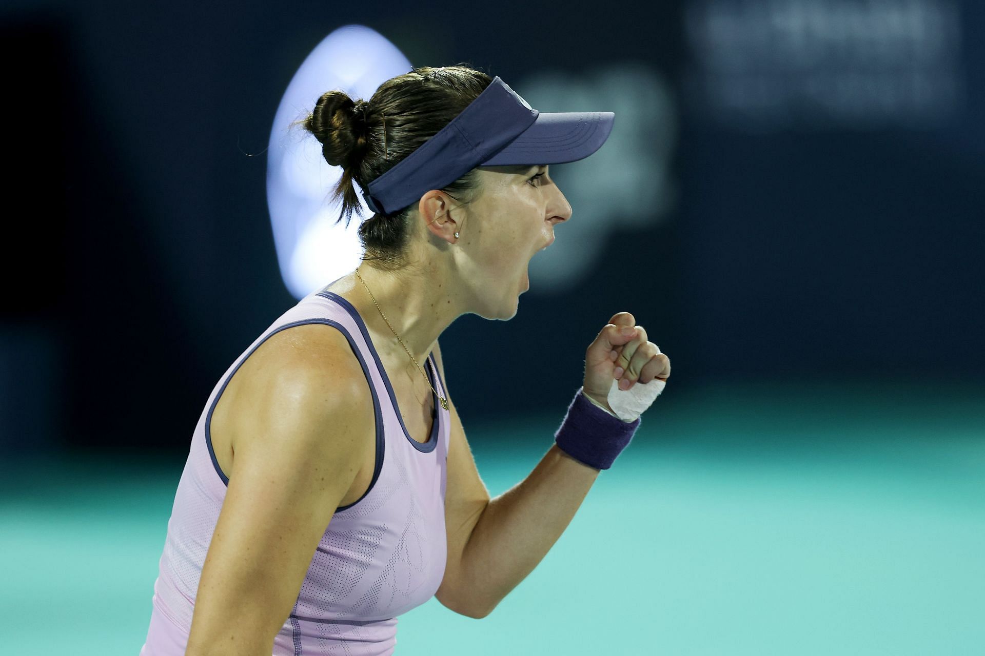 Bencic of Switzerland celebrates scoring a point against Ashlyn Krueger of the United States in the final match during day seven of the Mubadala Abu Dhabi Open - Source: Getty