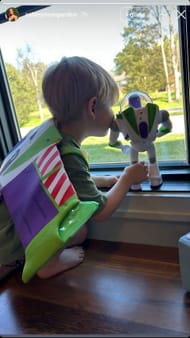 Ashley and Josef Newgarden's son Kota playing with Toy Story's Buzz Lightyear | Image via Instagram (@ashleynewgarden)