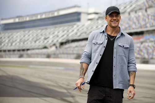 Alan Ritchson at the NASCAR Cup Series Daytona 500 (Image via Getty)