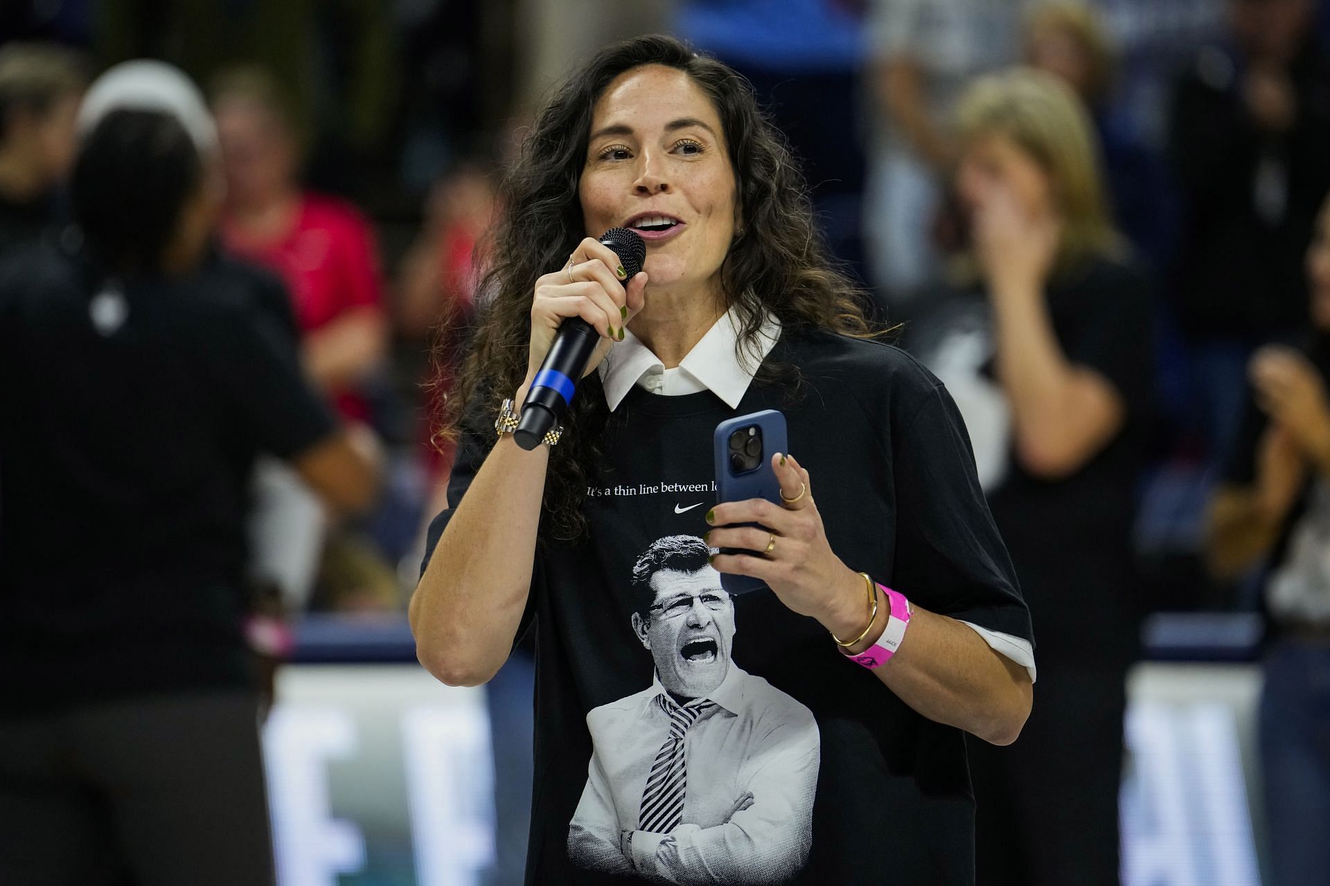 Sue Bird speaks during an event celebrating Connecticut Huskies head coach Geno Auriemma&rsquo;s all-time NCAA basketball wins record at the Harry A. Gampel Pavilion on November 20, 2024 in Storrs, Connecticut. (Photo by Joe Buglewicz/Getty Images)