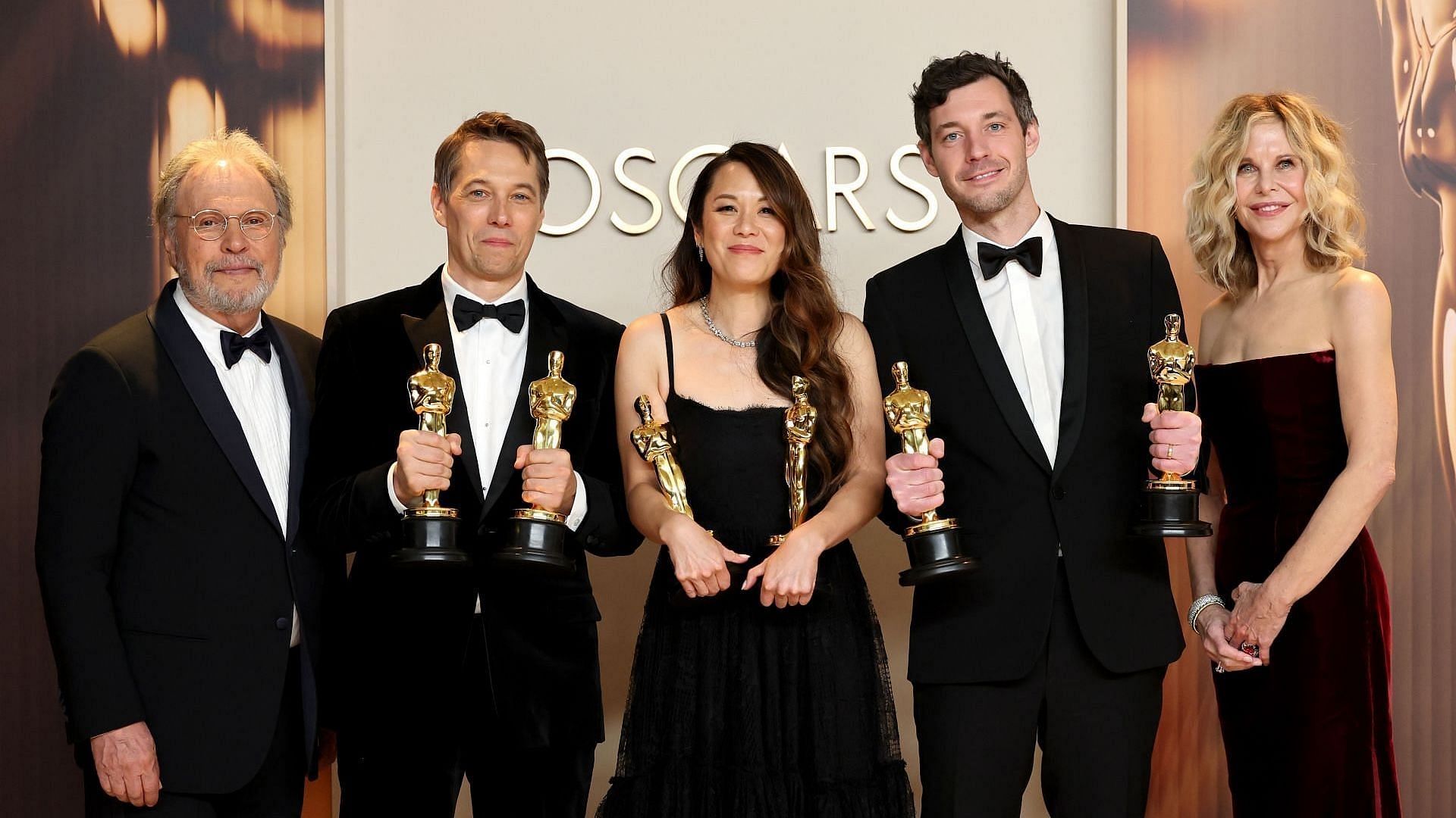 (L-R) Sean Baker, Samantha Quan, and Alex Coco, winners of the Best Picture for &ldquo;Anora&rdquo;, pose in the press room with Billy Crystal and Meg Ryan during the 97th Annual Oscars at Ovation Hollywood on March 02, 2025, in Hollywood, California. (Image via Getty/Mike Coppola)