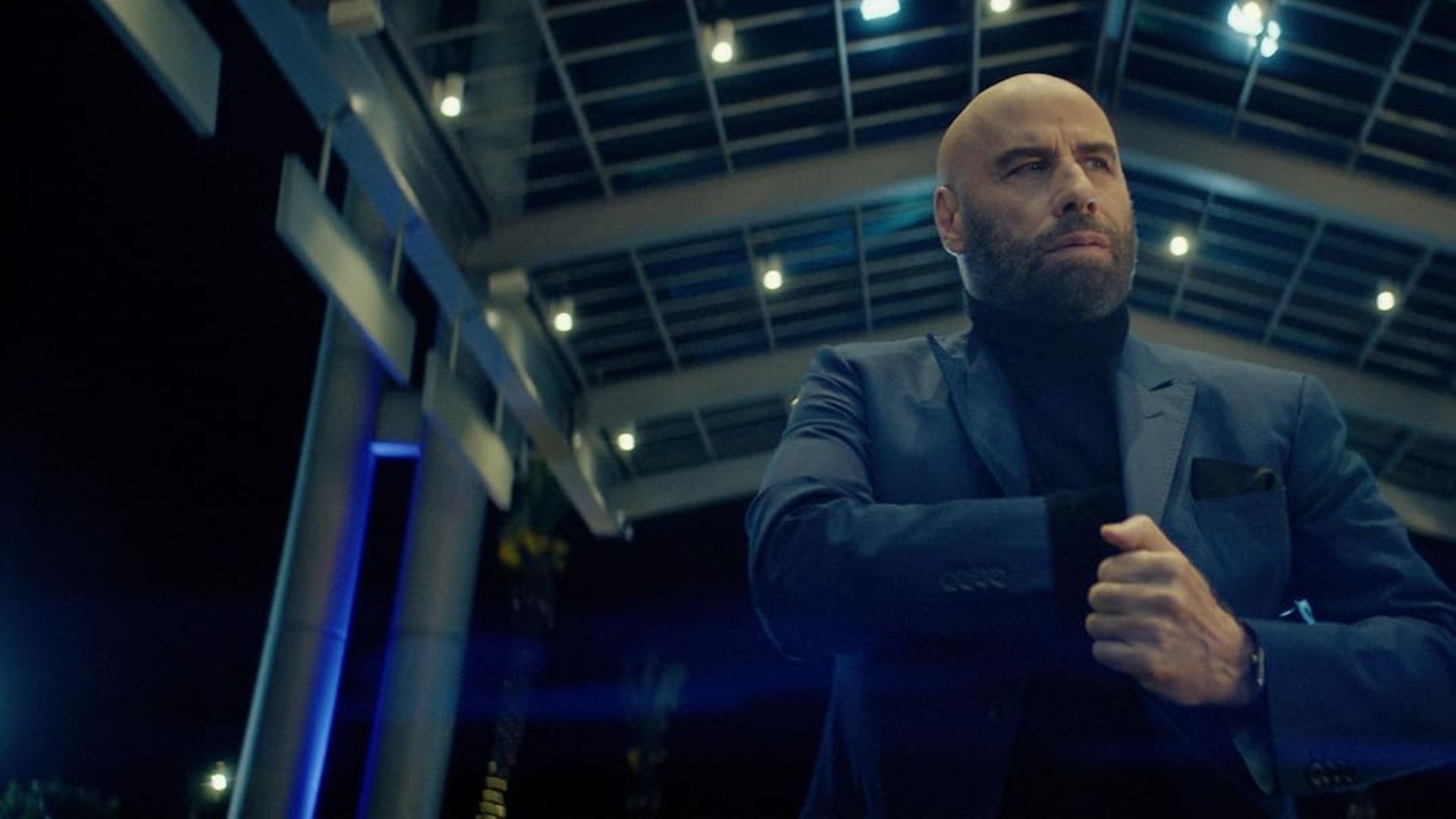 John Travolta as seen in the 2025 film High Rollers (Image via Prime Video)