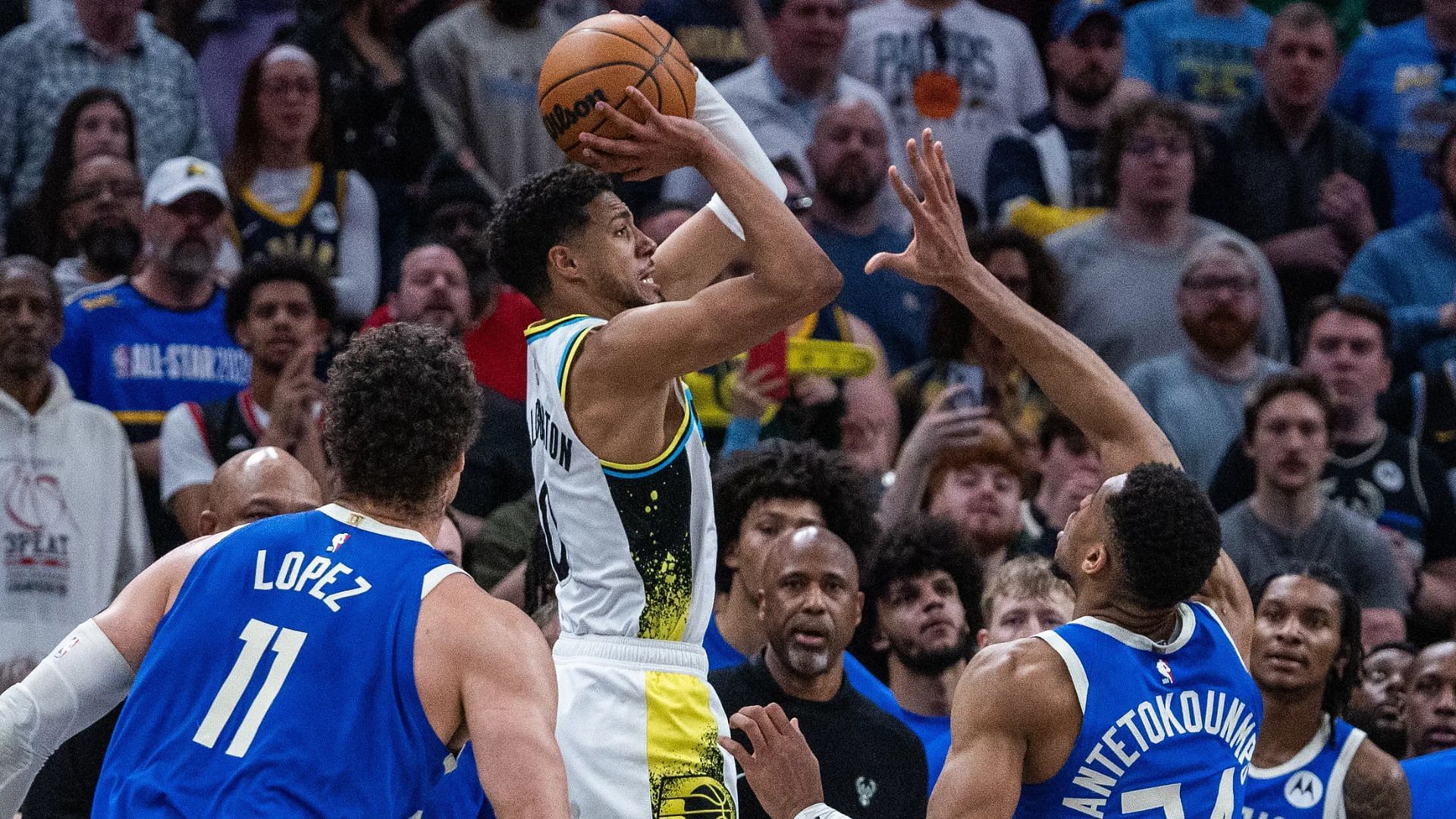 Fans erupt after Tyrese Haliburton hits a 3-point shot and gets fouled in miraculous game-winning play. (Photo: IMAGN)